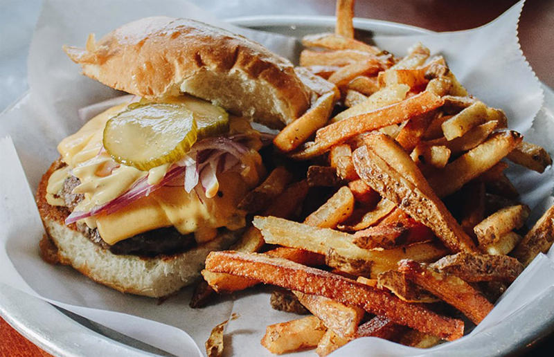 South Carolina: Classic, Big Gun Burger Shop, Charleston 54. Tennessee: Dyer's Single, Dyer's Burgers, Memphis, 53. Alabama: hamburger, Dub's Burgers, Athens, 52. Connecticut: The Original Burger, Louis' Lunch, New Haven, 51. California: Steakburger, The Apple Pan, Los Angeles, 50. Iowa: hamburger, B-Bops, various locations, 49. Maine: hamburger, Black Cow, Portland, 48. New Jersey: hamburger, White Manna, Hackensack, 47. New Hampshire: hamburger, Gilley’s Diner, Portsmouth, 46. Massachusetts: Hamburg, White Hut, West Springfield, 45. California: hamburger, In-N-Out Burger, various locations, 44. District of Columbia: Farmhouse Burger, Good Stuff Eatery, Georgetown, 43. Mississippi: Slugburger, Latham's Hamburger Inn, New Albany, 42. Utah: Big Ben, Burger Bar, Roy, 41. Wisconsin: hamburger, Sobelman's Pub & Grill, Milwaukee, 40. Wyoming: The Liberty Burger, Liberty Burger, Jackson, 39. Illinois: House-blend prime beef burger, Butcher & The Burger, Chicago, 38. Arizona: The Standard at The Stand Arcadia Burger Shoppe, Phoenix, 37. Colorado: Cricket Burger, The Cherry Cricket, Denver, 36. New York: Luger burger, Peter Luger Steakhouse, New York City, 35. Delaware: FTC, Farmer & the Cow, Wilmington, 34. Minnesota: Jucy Lucy, Matt’s Bar, Minneapolis, 33. Pennsylvania: hamburger, M2O Burgers & Salads, Philadelphia, 32. South Carolina: Classic, Big Gun Burger Shop, Charleston, 31. Idaho: The Classic, Holy Cow!, Nampa, 30. Kansas: House Burger, Dempsey's Burger Pub, Wichita, 29. Missouri: hamburger, Town Topic, Kansas City, 28. Nebraska: The Original, Cheeseburgers, Omaha, 27. New Mexico: Rustic, Rustic On The Green, Albuquerque, 26. Indiana: Smash burger, Workingman’s Friend, Indianapolis, 25. Vermont: Worthy Burger, Worthy Burger, South Royalton and Woodstock, 24. Arkansas: traditional hamburger, Hugo's, Fayetteville, 23. Texas: Tookie's Burger, Tookie's Hamburgers & More, Kemah, 22. Nevada: Plain Jane, Beefy's, Reno, 21. Georgia: Green Truck Classic, Green Truck Pub, Savannah, 20. New York: hamburger, All-American Hamburger Drive-In, Massapequa, 19. North Dakota: Carport, Sickies Garage Burgers & Brews, various locations, 18. Michigan: sliders, Motz’s Burgers, Detroit, 17. Michigan: Ground Round, Miller’s Bar, Dearborn, 16. Florida: hamburger, Mac's Drive-Thru, Gainesville, 15. West Virginia: Oscar, Oscar’s Breakfast, Burgers & Brews, Barboursville, 14. North Carolina: hamburger, Brooks’ Sandwich House, Charlotte, 13. Kentucky: The Purist, Bard's Burgers & Chili, Covington, 12. Maryland: Hamburger, Burger Bros., Towson, 11. Oklahoma: single onion burger, Tucker's Onion Burgers, various locations, 10. Rhode Island: Stanley Burger, Stanley’s Famous Hamburgers, Central Falls, 9. Virginia: Beauvine, Beauvine Burger Concept, Richmond, 8. Oregon: The Original 100, Hwy 101 Burger, Lincoln City, 7. Ohio: hamburger, Kewpee Hamburgers, Lima, 6. Hawaii: hamburger, Kua Aina Sandwich Shop, Haleiwa, 5. Alaska: The Burger Stop, Tommy's Burger Stop, Anchorage, 4. Montana: Hamburger, The Burger Drive, Billings, 3. Washington: Seattle Classic, Von's 1000 Spirits, Seattle, 2. Louisiana: Butcher Burger, Cochon Butcher, New Orleans