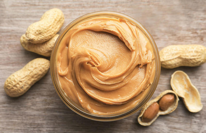 Turn your peanut butter upside down 67. Give breadcrumbs extra flavour, 66. Improve a boxed cake mix, 65. Warm a knife for neat slicing, 64. Make French toast in the slow cooker, 63. Ripen bananas slowly with a banana hanger, 62. Make dressing with almost-empty jars, 61. Use overripe bananas for the best banana bread, 60. Use vegetable water in gravy, 59. Add nutritional yeast for a cheesy flavour, 58. Combine miso and butter for a flavour hit, 57. Make frozen coffee cubes, 56. Pair your pasta and sauce correctly, 55. Keep baked goods soft with a slice of bread, 54. Use ice cube trays to freeze leftover sauce, 53. Use an ice cream scoop for meatballs, 52. Add sugar to savoury dishes and salt to sweet, 51. Peel tomatoes like a pro, 50. Prep ahead for smoothies, 49. Apply baking soda to stained food storage containers, 48. Try the hedgehog mango trick, 47. Stop syrup sticking to your spoons, 46. Use carbonated drinks for lighter batter, 45. Be creative with ketchup, 44. Buy ovenproof storage containers, 43. Sweeten tomato sauce with a carrot, 42. Make and freeze breakfast burritos, 41. Bulk out sauces with lentils, 40. Mix it up with a mug omelette, 39. Blanch your vegetables, 38. Use orange juice in marinades, 37. Put pasta water to good use, 36. Add beetroot to brownies, 35. Use a cupcake tin for egg muffins, 34. Roast potatoes in mayonnaise, 33. Raise your mac 'n' cheese game with mustard, 32. Score meat skin, 31. Ditch the oven for mug cakes, 30. Freeze fresh ginger, 29. Massage kale, 28. Use bread to stop your sugar clumping, 27. Froth milk the easy way, 26. Say yes to soy sauce on popcorn, 25. Use the microwave to peel garlic, 24. Cook bacon in the microwave, 23. Stop soggy sandwiches, 22. Separate onions and potatoes, 21. Use the float test for eggs, 20. Transform cake fails, 19. Use bicarbonate of soda to tenderise meat, 18. Store herby butter in the freezer, 17. Reuse sauce bottles for pancakes, 16. Turn your peanut butter jar upside down, 15. Stop using boiling water for coffee, 14. Use a hand mixer for mashed potatoes, 13. Microwave pizza with water, 12. Grate butter for easy spreading, 11. Microwave lemons to get more juice, 10. Make hash browns in your waffle iron, 9. Use a wine bottle as a rolling pin, 8. Use mayonnaise for perfect toasties, 7. Revive old bread with water, 6. Use your microwave for baked potatoes, 5. Rescue burnt biscuits with a grater, 4. Salvage split Hollandaise, 3. Poach eggs in cling film, 2. Store herbs like flowers