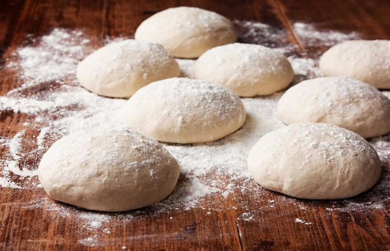 Rolling out the dough Pizza perfection, The best flour to use, Making dough, Rolling out the dough, Sauce: fresh tomatoes, Sauce: tinned tomatoes, Sauce: passata, Cheese: block mozzarella, How to achieve the crispy base, Getting pizza into a hot oven, Invest in a pizza cutter, Roman pizza, Stromboli, Pizza bianca, Four cheese pizza