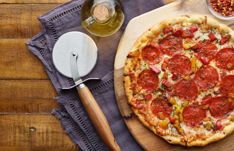 Invest in a pizza cutter Pizza perfection, The best flour to use, Making dough, Rolling out the dough, Sauce: fresh tomatoes, Sauce: tinned tomatoes, Sauce: passata, Cheese: block mozzarella, How to achieve the crispy base, Getting pizza into a hot oven, Invest in a pizza cutter, Roman pizza, Stromboli, Pizza bianca, Four cheese pizza