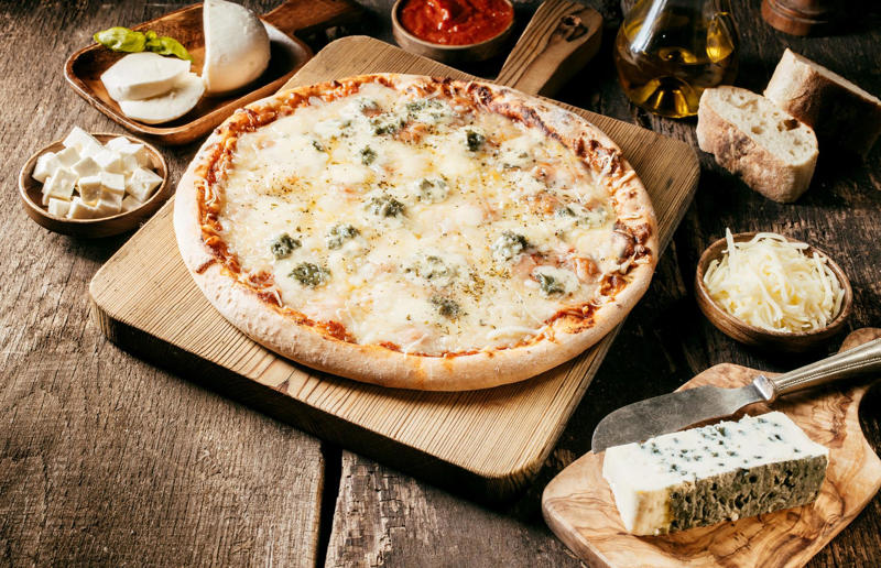 Four cheese pizza Pizza perfection, The best flour to use, Making dough, Rolling out the dough, Sauce: fresh tomatoes, Sauce: tinned tomatoes, Sauce: passata, Cheese: block mozzarella, How to achieve the crispy base, Getting pizza into a hot oven, Invest in a pizza cutter, Roman pizza, Stromboli, Pizza bianca, Four cheese pizza