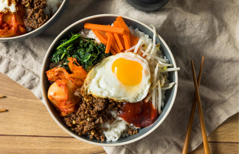 Ridiculously good rice recipes, Arancini, Bibimbap, Maqloubeh with aubergines and peppers, Stir-fried runner beans with holy basil, Jerk haddock and jollof rice salad, Butternut squash risotto, Cavolo nero biryani, Slow-cooked lamb shoulder with spiced rice, Prawn and cabbage fried rice, Stuffed aubergines