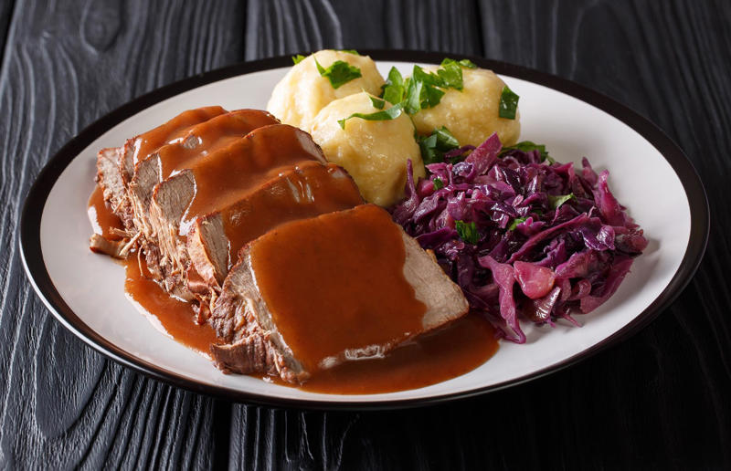 90. Peri peri chicken, Mozambique, 89. Sauerbraten, Germany, 88. Massaman, Thailand, 87. Spanakopita, Cyprus and Greece, 86. Cassoulet, France, 85. Banitsa, Bulgaria, 84. Barramundi, Australia, 83. Pastel de choclo, Chile, 82. Mole, Mexico, 81. Borscht, Ukraine, 80. Plov, Uzbekistan, 79. Bunny chow, South Africa, 78. Käsespätzle/ Käsknöpfle, Central Europe, 77. Chicken rice, Singapore, 76. Adobo, Philippines, 75. Rösti, Switzerland, 74. Falafel, Middle East, 73. Hoppers, Sri Lanka, 72. Nasi lemak, Malaysia, 71. Pupusa, El Salvador, 70. Beef rendang, Indonesia, 69. Tortilla de patatas, Spain, 68. French onion soup, France, 67. Colcannon, Ireland, 66. Bobotie, South Africa, 65. Haggis, Scotland, 64. Tamales, Central and South America, 63. Wiener schnitzel, Austria, 62. Feijoada, Brazil, 61. Souvlaki, Greece, 60. Laksa, Malaysia, 59. Clam chowder, USA, 58. Raclette, Switzerland, 57. Smørrebrød, Denmark, 56. Jollof rice, West Africa, 55. Poutine, Canada, 54. Goulash, Hungary, 53. Pho, Vietnam, 52. Biryani, India, 51. Arepa, Colombia and Venezuela, 50. Shawarma, Middle East, 49. Beef stroganoff, Russia, 48. Som tam, Laos, 47. Cacio e pepe, Italy, 46. Bouillabaisse, France, 45. Khachapuri, Georgia, 44. Ceviche, Peru, 43. Quesadilla, Mexico, 42. Masala dosa, India, 41. Moules frites, Belgium, 40. Köttbullar, Sweden, 39. Welsh rarebit, Wales, 38. Pierogi, Poland, 37. Poke, USA, 36. Tagine, Morocco, 35. Dim sum, China, 34. Gumbo, USA, 33. Kebab, Turkey, 32. Jerk chicken, Jamaica, 31. Singapore noodles, Hong Kong, 30. Asado, Argentina, 29. Beef Wellington, England, 28. Moussaka, Greece, 27. Tahdig, Iran, 26. Murgh makhani, India, 25. Gnocchi, Italy, 24. Sushi, Japan, 23. Texas-style barbecue, USA, 22. Fish and chips, UK, 21. Carbonara, Italy, 20. Tom yum soup, Thailand, 19. Cataplana, Portugal, 18. Mezze, Middle East, 17. Pad Thai, Thailand, 16. Steak frites, France, 15. Shakshuka, Middle East, 14. Tapas, Spain, 13. Gua bao, Taiwan, 12. Boeuf bourguignon, France, 11. Peking duck, China, 10. Chicken parmigiana, USA, 9. Bibimbap, South Korea, 8. Paella, Spain, 7. Tacos, Mexico, 6. Southern fried chicken, USA, 5. Sausage and mash, UK, 4. Ragù alla Bolognese, Italy, 3. Ramen, Japan, 2. Hamburger, USA