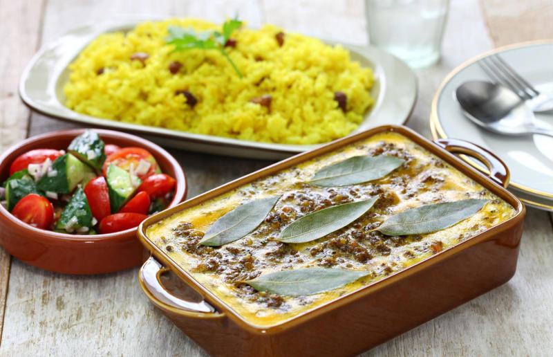 90. Peri peri chicken, Mozambique, 89. Sauerbraten, Germany, 88. Massaman, Thailand, 87. Spanakopita, Cyprus and Greece, 86. Cassoulet, France, 85. Banitsa, Bulgaria, 84. Barramundi, Australia, 83. Pastel de choclo, Chile, 82. Mole, Mexico, 81. Borscht, Ukraine, 80. Plov, Uzbekistan, 79. Bunny chow, South Africa, 78. Käsespätzle/ Käsknöpfle, Central Europe, 77. Chicken rice, Singapore, 76. Adobo, Philippines, 75. Rösti, Switzerland, 74. Falafel, Middle East, 73. Hoppers, Sri Lanka, 72. Nasi lemak, Malaysia, 71. Pupusa, El Salvador, 70. Beef rendang, Indonesia, 69. Tortilla de patatas, Spain, 68. French onion soup, France, 67. Colcannon, Ireland, 66. Bobotie, South Africa, 65. Haggis, Scotland, 64. Tamales, Central and South America, 63. Wiener schnitzel, Austria, 62. Feijoada, Brazil, 61. Souvlaki, Greece, 60. Laksa, Malaysia, 59. Clam chowder, USA, 58. Raclette, Switzerland, 57. Smørrebrød, Denmark, 56. Jollof rice, West Africa, 55. Poutine, Canada, 54. Goulash, Hungary, 53. Pho, Vietnam, 52. Biryani, India, 51. Arepa, Colombia and Venezuela, 50. Shawarma, Middle East, 49. Beef stroganoff, Russia, 48. Som tam, Laos, 47. Cacio e pepe, Italy, 46. Bouillabaisse, France, 45. Khachapuri, Georgia, 44. Ceviche, Peru, 43. Quesadilla, Mexico, 42. Masala dosa, India, 41. Moules frites, Belgium, 40. Köttbullar, Sweden, 39. Welsh rarebit, Wales, 38. Pierogi, Poland, 37. Poke, USA, 36. Tagine, Morocco, 35. Dim sum, China, 34. Gumbo, USA, 33. Kebab, Turkey, 32. Jerk chicken, Jamaica, 31. Singapore noodles, Hong Kong, 30. Asado, Argentina, 29. Beef Wellington, England, 28. Moussaka, Greece, 27. Tahdig, Iran, 26. Murgh makhani, India, 25. Gnocchi, Italy, 24. Sushi, Japan, 23. Texas-style barbecue, USA, 22. Fish and chips, UK, 21. Carbonara, Italy, 20. Tom yum soup, Thailand, 19. Cataplana, Portugal, 18. Mezze, Middle East, 17. Pad Thai, Thailand, 16. Steak frites, France, 15. Shakshuka, Middle East, 14. Tapas, Spain, 13. Gua bao, Taiwan, 12. Boeuf bourguignon, France, 11. Peking duck, China, 10. Chicken parmigiana, USA, 9. Bibimbap, South Korea, 8. Paella, Spain, 7. Tacos, Mexico, 6. Southern fried chicken, USA, 5. Sausage and mash, UK, 4. Ragù alla Bolognese, Italy, 3. Ramen, Japan, 2. Hamburger, USA