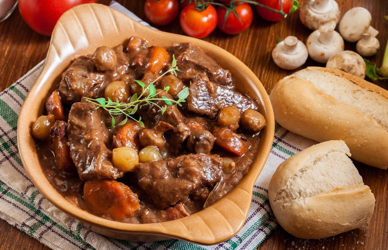 90. Peri peri chicken, Mozambique, 89. Sauerbraten, Germany, 88. Massaman, Thailand, 87. Spanakopita, Cyprus and Greece, 86. Cassoulet, France, 85. Banitsa, Bulgaria, 84. Barramundi, Australia, 83. Pastel de choclo, Chile, 82. Mole, Mexico, 81. Borscht, Ukraine, 80. Plov, Uzbekistan, 79. Bunny chow, South Africa, 78. Käsespätzle/ Käsknöpfle, Central Europe, 77. Chicken rice, Singapore, 76. Adobo, Philippines, 75. Rösti, Switzerland, 74. Falafel, Middle East, 73. Hoppers, Sri Lanka, 72. Nasi lemak, Malaysia, 71. Pupusa, El Salvador, 70. Beef rendang, Indonesia, 69. Tortilla de patatas, Spain, 68. French onion soup, France, 67. Colcannon, Ireland, 66. Bobotie, South Africa, 65. Haggis, Scotland, 64. Tamales, Central and South America, 63. Wiener schnitzel, Austria, 62. Feijoada, Brazil, 61. Souvlaki, Greece, 60. Laksa, Malaysia, 59. Clam chowder, USA, 58. Raclette, Switzerland, 57. Smørrebrød, Denmark, 56. Jollof rice, West Africa, 55. Poutine, Canada, 54. Goulash, Hungary, 53. Pho, Vietnam, 52. Biryani, India, 51. Arepa, Colombia and Venezuela, 50. Shawarma, Middle East, 49. Beef stroganoff, Russia, 48. Som tam, Laos, 47. Cacio e pepe, Italy, 46. Bouillabaisse, France, 45. Khachapuri, Georgia, 44. Ceviche, Peru, 43. Quesadilla, Mexico, 42. Masala dosa, India, 41. Moules frites, Belgium, 40. Köttbullar, Sweden, 39. Welsh rarebit, Wales, 38. Pierogi, Poland, 37. Poke, USA, 36. Tagine, Morocco, 35. Dim sum, China, 34. Gumbo, USA, 33. Kebab, Turkey, 32. Jerk chicken, Jamaica, 31. Singapore noodles, Hong Kong, 30. Asado, Argentina, 29. Beef Wellington, England, 28. Moussaka, Greece, 27. Tahdig, Iran, 26. Murgh makhani, India, 25. Gnocchi, Italy, 24. Sushi, Japan, 23. Texas-style barbecue, USA, 22. Fish and chips, UK, 21. Carbonara, Italy, 20. Tom yum soup, Thailand, 19. Cataplana, Portugal, 18. Mezze, Middle East, 17. Pad Thai, Thailand, 16. Steak frites, France, 15. Shakshuka, Middle East, 14. Tapas, Spain, 13. Gua bao, Taiwan, 12. Boeuf bourguignon, France, 11. Peking duck, China, 10. Chicken parmigiana, USA, 9. Bibimbap, South Korea, 8. Paella, Spain, 7. Tacos, Mexico, 6. Southern fried chicken, USA, 5. Sausage and mash, UK, 4. Ragù alla Bolognese, Italy, 3. Ramen, Japan, 2. Hamburger, USA