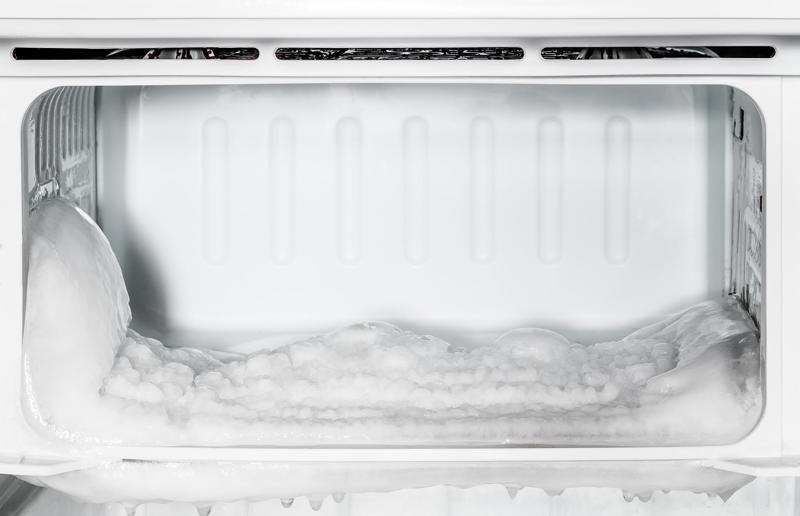 Neglecting the freezer What not to do with your home gadgets, Not replacing range hood filters, Mounting a TV above a fireplace, Abandoning the iron, Ignoring a loose oven door seal, Ignoring rust on dishwasher tines, Not caring for the washing machine, Overlooking washing machine mechanisms, Not cleaning the blender immediately, Grilling with the door closed, Failing to descale the kettle, Opening the microwave door during cooking, Ignoring broken fridge gaskets, Overlooking air-conditioning filters, Overloading appliances, Forgetting about the hairdryer, Neglecting the freezer, Abandoning refrigerator coils, Misusing the garbage disposal, Overlooking the showerhead, Leaving the microwave switched on