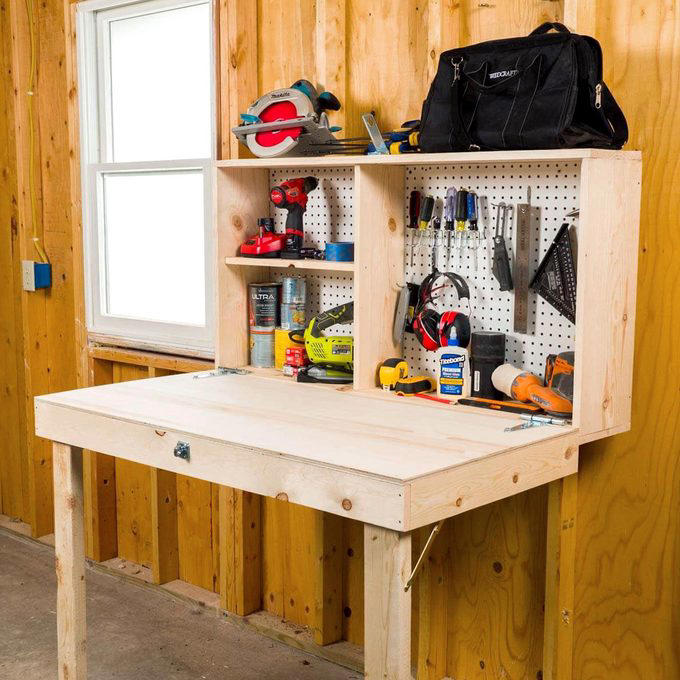 Magnetic Toolbox Labels, Pallet Dolly, Hang Anything, Handy Rag Cutter, Floor Ruler, Small Shop Space Saver, DIY Garage Storage for Cords and Hoses, Repurpose a Pallet for DIY Garage Storage, Corral Sports Gear, Overhead DIY Garage Storage System, Sliding Pegboard Storage System, Lockable Garage Storage Cabinet, Rotating Corner Shelves, Fold-Up Workbench, Garden/Garage Tool Caddy, Garage Storage Tubes, Roll-Around Workshop, Upcycled Garage Storage Idea, Garage Door Extension Cord Storage, Under-Joist Shelf