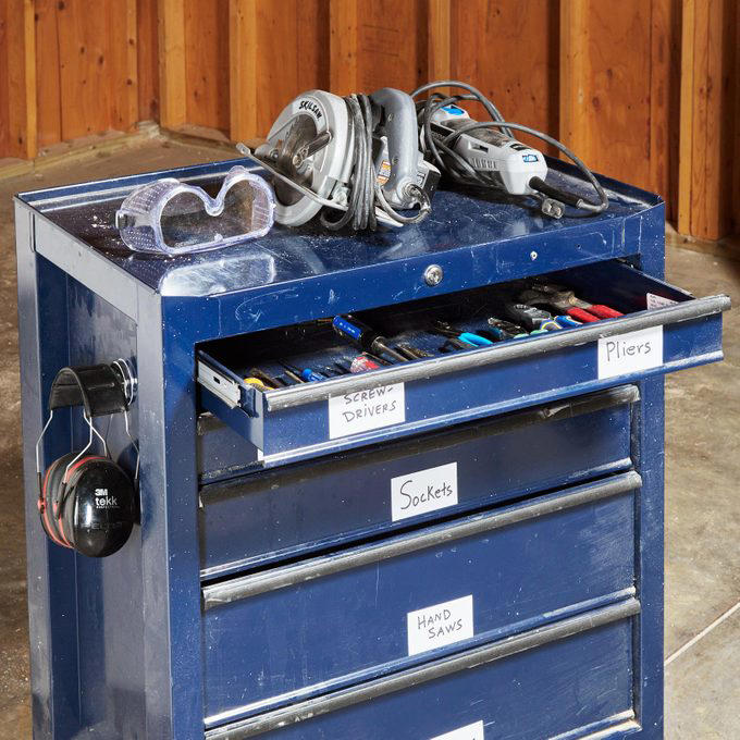 Magnetic Toolbox Labels, Pallet Dolly, Hang Anything, Handy Rag Cutter, Floor Ruler, Small Shop Space Saver, DIY Garage Storage for Cords and Hoses, Repurpose a Pallet for DIY Garage Storage, Corral Sports Gear, Overhead DIY Garage Storage System, Sliding Pegboard Storage System, Lockable Garage Storage Cabinet, Rotating Corner Shelves, Fold-Up Workbench, Garden/Garage Tool Caddy, Garage Storage Tubes, Roll-Around Workshop, Upcycled Garage Storage Idea, Garage Door Extension Cord Storage, Under-Joist Shelf