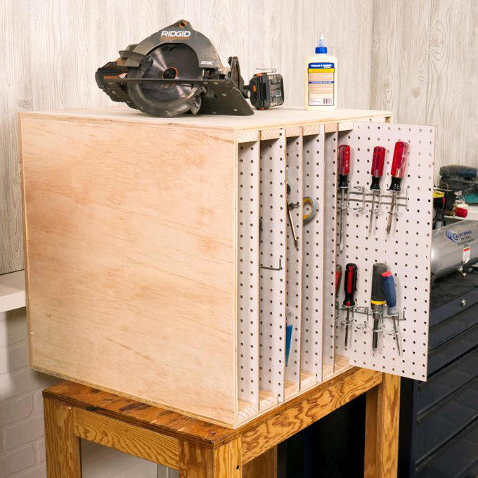 Magnetic Toolbox Labels, Pallet Dolly, Hang Anything, Handy Rag Cutter, Floor Ruler, Small Shop Space Saver, DIY Garage Storage for Cords and Hoses, Repurpose a Pallet for DIY Garage Storage, Corral Sports Gear, Overhead DIY Garage Storage System, Sliding Pegboard Storage System, Lockable Garage Storage Cabinet, Rotating Corner Shelves, Fold-Up Workbench, Garden/Garage Tool Caddy, Garage Storage Tubes, Roll-Around Workshop, Upcycled Garage Storage Idea, Garage Door Extension Cord Storage, Under-Joist Shelf