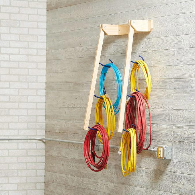 Magnetic Toolbox Labels, Pallet Dolly, Hang Anything, Handy Rag Cutter, Floor Ruler, Small Shop Space Saver, DIY Garage Storage for Cords and Hoses, Repurpose a Pallet for DIY Garage Storage, Corral Sports Gear, Overhead DIY Garage Storage System, Sliding Pegboard Storage System, Lockable Garage Storage Cabinet, Rotating Corner Shelves, Fold-Up Workbench, Garden/Garage Tool Caddy, Garage Storage Tubes, Roll-Around Workshop, Upcycled Garage Storage Idea, Garage Door Extension Cord Storage, Under-Joist Shelf
