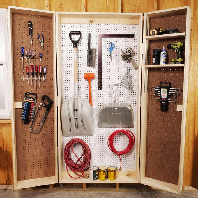 Magnetic Toolbox Labels, Pallet Dolly, Hang Anything, Handy Rag Cutter, Floor Ruler, Small Shop Space Saver, DIY Garage Storage for Cords and Hoses, Repurpose a Pallet for DIY Garage Storage, Corral Sports Gear, Overhead DIY Garage Storage System, Sliding Pegboard Storage System, Lockable Garage Storage Cabinet, Rotating Corner Shelves, Fold-Up Workbench, Garden/Garage Tool Caddy, Garage Storage Tubes, Roll-Around Workshop, Upcycled Garage Storage Idea, Garage Door Extension Cord Storage, Under-Joist Shelf