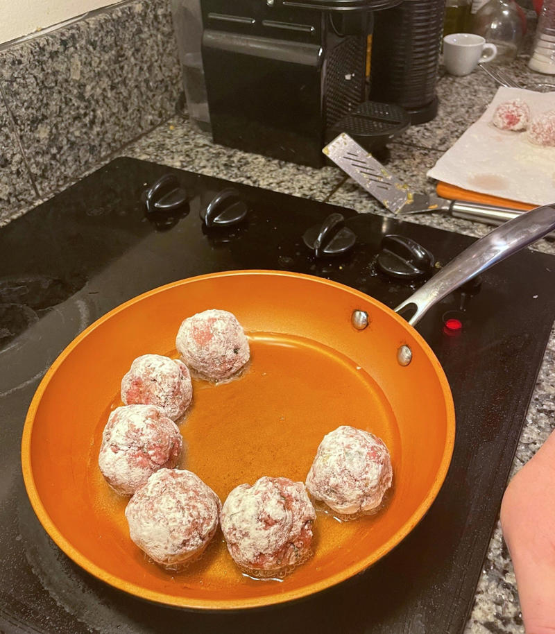 Before making the meatballs, we just need to do some quick prep., Then, mix everything together with your hands., Once your mixture is ready, start shaping the meatballs., Add the meatballs, one by one, into the pan., Use two forks to gently rotate each meatball every two minutes., It will take about 10 minutes to cook the meatballs.