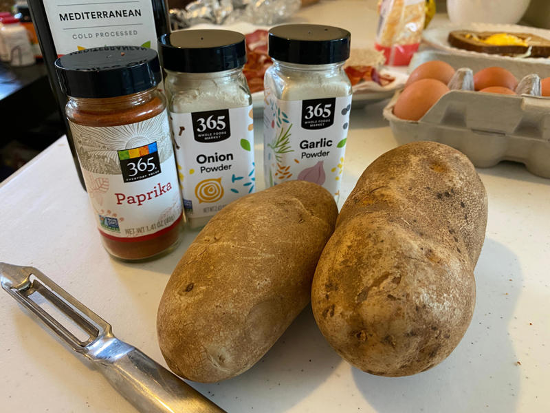 I started out with bacon, The bacon came out perfectly crispy, Next, I made breakfast potatoes, These home fries came out a little overcooked, For my 3rd recipe, I whipped up eggs in a basket, Next, I tried making an air-fryer frittata, For my final recipe, I attempted to make French toast, I barely had to add syrup for this recipe to taste good
