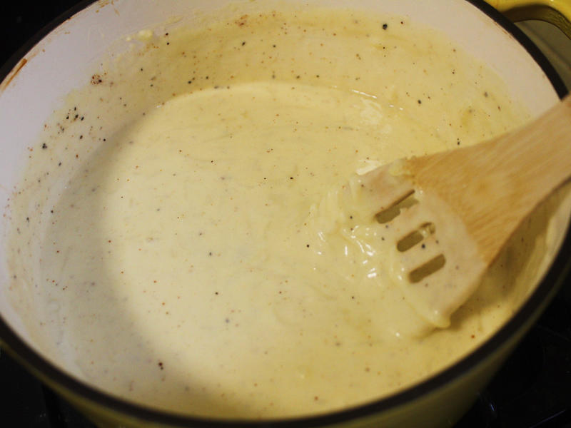 Next, I cooked the macaroni noodles., The recipe calls for a whopping 8 tablespoons of unsalted butter., I then added the hot milk into the flour-and-butter mixture., While the squash was roasting, I started cooking the onions.