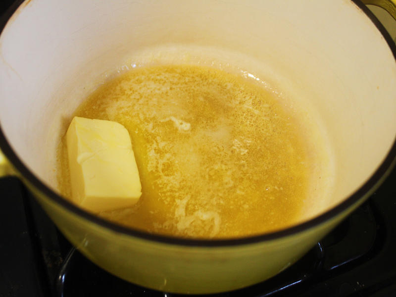 Next, I cooked the macaroni noodles., The recipe calls for a whopping 8 tablespoons of unsalted butter., I then added the hot milk into the flour-and-butter mixture., While the squash was roasting, I started cooking the onions.