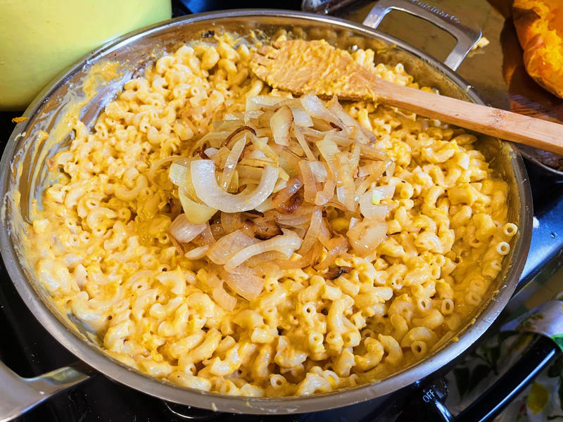 Next, I cooked the macaroni noodles., The recipe calls for a whopping 8 tablespoons of unsalted butter., I then added the hot milk into the flour-and-butter mixture., While the squash was roasting, I started cooking the onions.