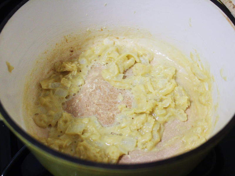 Next, I cooked the macaroni noodles., The recipe calls for a whopping 8 tablespoons of unsalted butter., I then added the hot milk into the flour-and-butter mixture., While the squash was roasting, I started cooking the onions.