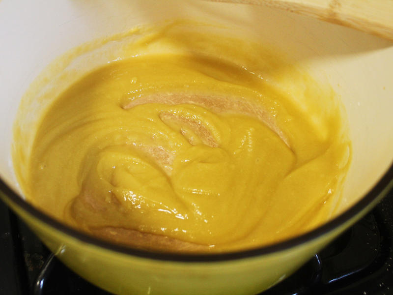 Next, I cooked the macaroni noodles., The recipe calls for a whopping 8 tablespoons of unsalted butter., I then added the hot milk into the flour-and-butter mixture., While the squash was roasting, I started cooking the onions.