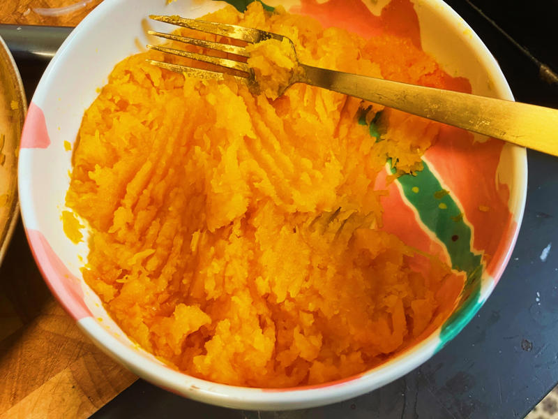 Next, I cooked the macaroni noodles., The recipe calls for a whopping 8 tablespoons of unsalted butter., I then added the hot milk into the flour-and-butter mixture., While the squash was roasting, I started cooking the onions.