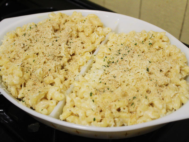 Next, I cooked the macaroni noodles., The recipe calls for a whopping 8 tablespoons of unsalted butter., I then added the hot milk into the flour-and-butter mixture., While the squash was roasting, I started cooking the onions.