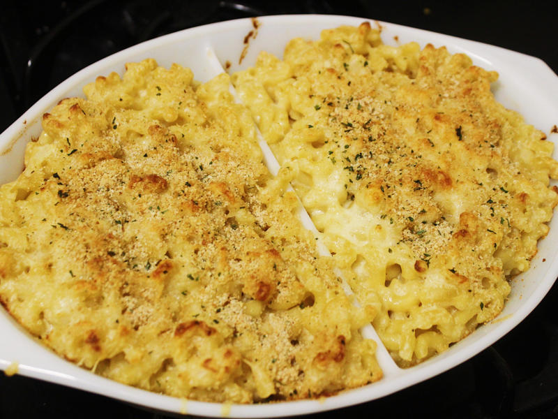 Next, I cooked the macaroni noodles., The recipe calls for a whopping 8 tablespoons of unsalted butter., I then added the hot milk into the flour-and-butter mixture., While the squash was roasting, I started cooking the onions.