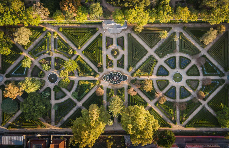 Bird's-eye views you won't believe are real, Konditaget Luders, Copenhagen, Denmark, Ajuda Botanical Garden, Lisbon, Portugal, Henningsvaer football pitch, Lofoten Islands, Norway, Guanajuato, Mexico, Innis Chonnel Castle, Loch Awe, Scotland, Tegallalang rice terraces, Indonesia, Hong Kong, Salt Pans, Gozo, Malta, Shark Fin Cove, Davenport, California, USA, Koh Lipe, Thailand, Golden Gate Bridge, San Francisco, California, USA, Grace Bay, Turks and Caicos Islands, Namib Desert, Namibia, Transfagarasan, Romania, Niagara Falls, Canada/USA, New York City, New York, USA, Road near Laki Volcano, Iceland, Atacama Desert, Chile, San Francisco, California, USA, Na Pali Coast State Wilderness Park, Kauai Island, Hawaii, USA, Yan'an Elevated Road Interchange, Shanghai, China, Navagio Beach, Zakynthos, Greece, Forests around Berthoud Pass, Colorado, USA, Maasai Mara National Reserve, Kenya, Estrada Marginal Norte, Peniche, Portugal, Twelve Apostles, Victoria, Australia, Wongwian Yai, Bangkok, Thailand, Choui Fong Tea Farm, Thailand, Rogers Centre, Toronto, Canada, Silhouette Island, Seychelles, Richfield County Park, Davison, Michigan, USA, Fez, Morocco, Cleopatra Beach, Turkey, Okavango Delta, Botswana, Ningaloo Marine Park, Exmouth, Australia, Mekong Delta, Vietnam, Copacabana Beach, Rio de Janeiro, Brazil, Rheinschlucht, Versam, Switzerland, Colonia de Sant Jordi, Ses Salines, Mallorca, Spain, Sheikh Zayed Road Interchange 1, Dubai, UAE, Zhangye National Geopark, China, Lavender fields in Provence, France, Shifen Waterfall, Taiwan, Misfat Al Abriyeen, Oman, Dubrovnik, Croatia, Clarence Battery, Guernsey, UK, Hverir Geothermal Area, Iceland, Chapman Peak Drive, Cape Town, South Africa, Ronda, Malaga, Spain, Jokulsarlon, Iceland, Rub' Al Khali, Arabian Desert, Vaavu Atoll, Maldives, Bled Island, Slovenia, Gorreana Tea Factory, the Azores, Portugal, Pyrgos Kallistis, Santorini, Greece, Croyde Bay, Devon, UK, Bay of Kotor, Montenegro, Joffre Lakes Provincial Park, Canada, Grand Prismatic Spring, Yellowstone National Park, Wyoming, USA