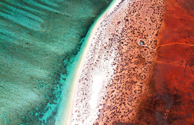 Bird's-eye views you won't believe are real, Konditaget Luders, Copenhagen, Denmark, Ajuda Botanical Garden, Lisbon, Portugal, Henningsvaer football pitch, Lofoten Islands, Norway, Guanajuato, Mexico, Innis Chonnel Castle, Loch Awe, Scotland, Tegallalang rice terraces, Indonesia, Hong Kong, Salt Pans, Gozo, Malta, Shark Fin Cove, Davenport, California, USA, Koh Lipe, Thailand, Golden Gate Bridge, San Francisco, California, USA, Grace Bay, Turks and Caicos Islands, Namib Desert, Namibia, Transfagarasan, Romania, Niagara Falls, Canada/USA, New York City, New York, USA, Road near Laki Volcano, Iceland, Atacama Desert, Chile, San Francisco, California, USA, Na Pali Coast State Wilderness Park, Kauai Island, Hawaii, USA, Yan'an Elevated Road Interchange, Shanghai, China, Navagio Beach, Zakynthos, Greece, Forests around Berthoud Pass, Colorado, USA, Maasai Mara National Reserve, Kenya, Estrada Marginal Norte, Peniche, Portugal, Twelve Apostles, Victoria, Australia, Wongwian Yai, Bangkok, Thailand, Choui Fong Tea Farm, Thailand, Rogers Centre, Toronto, Canada, Silhouette Island, Seychelles, Richfield County Park, Davison, Michigan, USA, Fez, Morocco, Cleopatra Beach, Turkey, Okavango Delta, Botswana, Ningaloo Marine Park, Exmouth, Australia, Mekong Delta, Vietnam, Copacabana Beach, Rio de Janeiro, Brazil, Rheinschlucht, Versam, Switzerland, Colonia de Sant Jordi, Ses Salines, Mallorca, Spain, Sheikh Zayed Road Interchange 1, Dubai, UAE, Zhangye National Geopark, China, Lavender fields in Provence, France, Shifen Waterfall, Taiwan, Misfat Al Abriyeen, Oman, Dubrovnik, Croatia, Clarence Battery, Guernsey, UK, Hverir Geothermal Area, Iceland, Chapman Peak Drive, Cape Town, South Africa, Ronda, Malaga, Spain, Jokulsarlon, Iceland, Rub' Al Khali, Arabian Desert, Vaavu Atoll, Maldives, Bled Island, Slovenia, Gorreana Tea Factory, the Azores, Portugal, Pyrgos Kallistis, Santorini, Greece, Croyde Bay, Devon, UK, Bay of Kotor, Montenegro, Joffre Lakes Provincial Park, Canada, Grand Prismatic Spring, Yellowstone National Park, Wyoming, USA