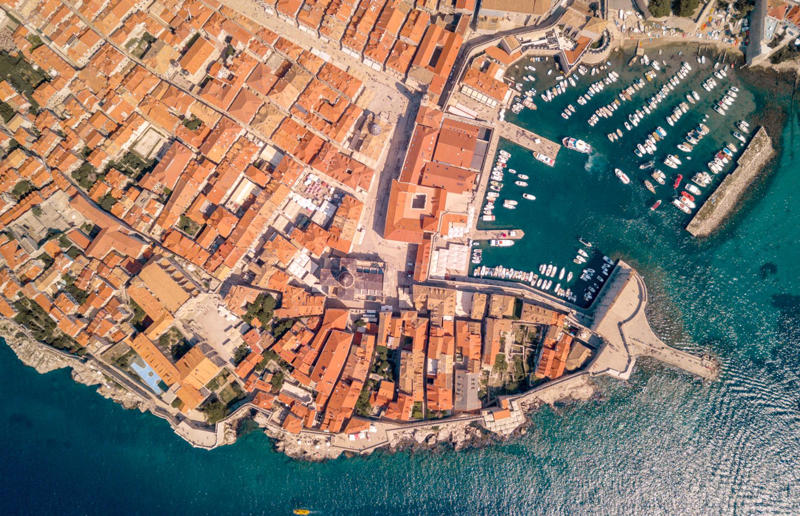 Bird's-eye views you won't believe are real, Konditaget Luders, Copenhagen, Denmark, Ajuda Botanical Garden, Lisbon, Portugal, Henningsvaer football pitch, Lofoten Islands, Norway, Guanajuato, Mexico, Innis Chonnel Castle, Loch Awe, Scotland, Tegallalang rice terraces, Indonesia, Hong Kong, Salt Pans, Gozo, Malta, Shark Fin Cove, Davenport, California, USA, Koh Lipe, Thailand, Golden Gate Bridge, San Francisco, California, USA, Grace Bay, Turks and Caicos Islands, Namib Desert, Namibia, Transfagarasan, Romania, Niagara Falls, Canada/USA, New York City, New York, USA, Road near Laki Volcano, Iceland, Atacama Desert, Chile, San Francisco, California, USA, Na Pali Coast State Wilderness Park, Kauai Island, Hawaii, USA, Yan'an Elevated Road Interchange, Shanghai, China, Navagio Beach, Zakynthos, Greece, Forests around Berthoud Pass, Colorado, USA, Maasai Mara National Reserve, Kenya, Estrada Marginal Norte, Peniche, Portugal, Twelve Apostles, Victoria, Australia, Wongwian Yai, Bangkok, Thailand, Choui Fong Tea Farm, Thailand, Rogers Centre, Toronto, Canada, Silhouette Island, Seychelles, Richfield County Park, Davison, Michigan, USA, Fez, Morocco, Cleopatra Beach, Turkey, Okavango Delta, Botswana, Ningaloo Marine Park, Exmouth, Australia, Mekong Delta, Vietnam, Copacabana Beach, Rio de Janeiro, Brazil, Rheinschlucht, Versam, Switzerland, Colonia de Sant Jordi, Ses Salines, Mallorca, Spain, Sheikh Zayed Road Interchange 1, Dubai, UAE, Zhangye National Geopark, China, Lavender fields in Provence, France, Shifen Waterfall, Taiwan, Misfat Al Abriyeen, Oman, Dubrovnik, Croatia, Clarence Battery, Guernsey, UK, Hverir Geothermal Area, Iceland, Chapman Peak Drive, Cape Town, South Africa, Ronda, Malaga, Spain, Jokulsarlon, Iceland, Rub' Al Khali, Arabian Desert, Vaavu Atoll, Maldives, Bled Island, Slovenia, Gorreana Tea Factory, the Azores, Portugal, Pyrgos Kallistis, Santorini, Greece, Croyde Bay, Devon, UK, Bay of Kotor, Montenegro, Joffre Lakes Provincial Park, Canada, Grand Prismatic Spring, Yellowstone National Park, Wyoming, USA
