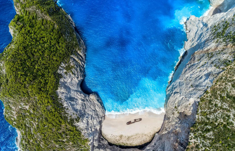 Bird's-eye views you won't believe are real, Konditaget Luders, Copenhagen, Denmark, Ajuda Botanical Garden, Lisbon, Portugal, Henningsvaer football pitch, Lofoten Islands, Norway, Guanajuato, Mexico, Innis Chonnel Castle, Loch Awe, Scotland, Tegallalang rice terraces, Indonesia, Hong Kong, Salt Pans, Gozo, Malta, Shark Fin Cove, Davenport, California, USA, Koh Lipe, Thailand, Golden Gate Bridge, San Francisco, California, USA, Grace Bay, Turks and Caicos Islands, Namib Desert, Namibia, Transfagarasan, Romania, Niagara Falls, Canada/USA, New York City, New York, USA, Road near Laki Volcano, Iceland, Atacama Desert, Chile, San Francisco, California, USA, Na Pali Coast State Wilderness Park, Kauai Island, Hawaii, USA, Yan'an Elevated Road Interchange, Shanghai, China, Navagio Beach, Zakynthos, Greece, Forests around Berthoud Pass, Colorado, USA, Maasai Mara National Reserve, Kenya, Estrada Marginal Norte, Peniche, Portugal, Twelve Apostles, Victoria, Australia, Wongwian Yai, Bangkok, Thailand, Choui Fong Tea Farm, Thailand, Rogers Centre, Toronto, Canada, Silhouette Island, Seychelles, Richfield County Park, Davison, Michigan, USA, Fez, Morocco, Cleopatra Beach, Turkey, Okavango Delta, Botswana, Ningaloo Marine Park, Exmouth, Australia, Mekong Delta, Vietnam, Copacabana Beach, Rio de Janeiro, Brazil, Rheinschlucht, Versam, Switzerland, Colonia de Sant Jordi, Ses Salines, Mallorca, Spain, Sheikh Zayed Road Interchange 1, Dubai, UAE, Zhangye National Geopark, China, Lavender fields in Provence, France, Shifen Waterfall, Taiwan, Misfat Al Abriyeen, Oman, Dubrovnik, Croatia, Clarence Battery, Guernsey, UK, Hverir Geothermal Area, Iceland, Chapman Peak Drive, Cape Town, South Africa, Ronda, Malaga, Spain, Jokulsarlon, Iceland, Rub' Al Khali, Arabian Desert, Vaavu Atoll, Maldives, Bled Island, Slovenia, Gorreana Tea Factory, the Azores, Portugal, Pyrgos Kallistis, Santorini, Greece, Croyde Bay, Devon, UK, Bay of Kotor, Montenegro, Joffre Lakes Provincial Park, Canada, Grand Prismatic Spring, Yellowstone National Park, Wyoming, USA