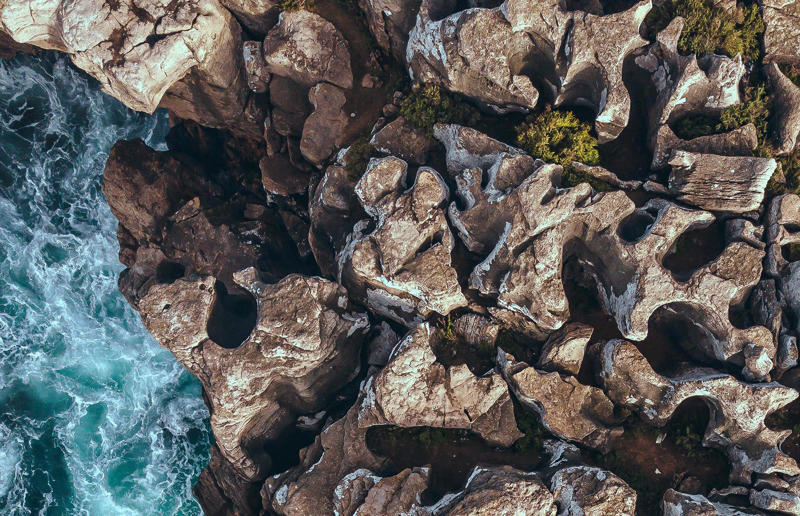 Bird's-eye views you won't believe are real, Konditaget Luders, Copenhagen, Denmark, Ajuda Botanical Garden, Lisbon, Portugal, Henningsvaer football pitch, Lofoten Islands, Norway, Guanajuato, Mexico, Innis Chonnel Castle, Loch Awe, Scotland, Tegallalang rice terraces, Indonesia, Hong Kong, Salt Pans, Gozo, Malta, Shark Fin Cove, Davenport, California, USA, Koh Lipe, Thailand, Golden Gate Bridge, San Francisco, California, USA, Grace Bay, Turks and Caicos Islands, Namib Desert, Namibia, Transfagarasan, Romania, Niagara Falls, Canada/USA, New York City, New York, USA, Road near Laki Volcano, Iceland, Atacama Desert, Chile, San Francisco, California, USA, Na Pali Coast State Wilderness Park, Kauai Island, Hawaii, USA, Yan'an Elevated Road Interchange, Shanghai, China, Navagio Beach, Zakynthos, Greece, Forests around Berthoud Pass, Colorado, USA, Maasai Mara National Reserve, Kenya, Estrada Marginal Norte, Peniche, Portugal, Twelve Apostles, Victoria, Australia, Wongwian Yai, Bangkok, Thailand, Choui Fong Tea Farm, Thailand, Rogers Centre, Toronto, Canada, Silhouette Island, Seychelles, Richfield County Park, Davison, Michigan, USA, Fez, Morocco, Cleopatra Beach, Turkey, Okavango Delta, Botswana, Ningaloo Marine Park, Exmouth, Australia, Mekong Delta, Vietnam, Copacabana Beach, Rio de Janeiro, Brazil, Rheinschlucht, Versam, Switzerland, Colonia de Sant Jordi, Ses Salines, Mallorca, Spain, Sheikh Zayed Road Interchange 1, Dubai, UAE, Zhangye National Geopark, China, Lavender fields in Provence, France, Shifen Waterfall, Taiwan, Misfat Al Abriyeen, Oman, Dubrovnik, Croatia, Clarence Battery, Guernsey, UK, Hverir Geothermal Area, Iceland, Chapman Peak Drive, Cape Town, South Africa, Ronda, Malaga, Spain, Jokulsarlon, Iceland, Rub' Al Khali, Arabian Desert, Vaavu Atoll, Maldives, Bled Island, Slovenia, Gorreana Tea Factory, the Azores, Portugal, Pyrgos Kallistis, Santorini, Greece, Croyde Bay, Devon, UK, Bay of Kotor, Montenegro, Joffre Lakes Provincial Park, Canada, Grand Prismatic Spring, Yellowstone National Park, Wyoming, USA