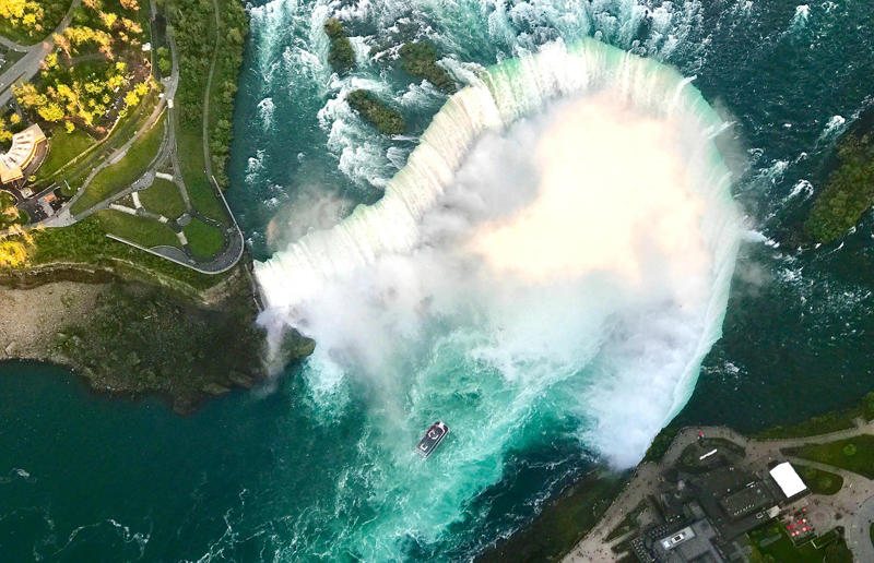Bird's-eye views you won't believe are real, Konditaget Luders, Copenhagen, Denmark, Ajuda Botanical Garden, Lisbon, Portugal, Henningsvaer football pitch, Lofoten Islands, Norway, Guanajuato, Mexico, Innis Chonnel Castle, Loch Awe, Scotland, Tegallalang rice terraces, Indonesia, Hong Kong, Salt Pans, Gozo, Malta, Shark Fin Cove, Davenport, California, USA, Koh Lipe, Thailand, Golden Gate Bridge, San Francisco, California, USA, Grace Bay, Turks and Caicos Islands, Namib Desert, Namibia, Transfagarasan, Romania, Niagara Falls, Canada/USA, New York City, New York, USA, Road near Laki Volcano, Iceland, Atacama Desert, Chile, San Francisco, California, USA, Na Pali Coast State Wilderness Park, Kauai Island, Hawaii, USA, Yan'an Elevated Road Interchange, Shanghai, China, Navagio Beach, Zakynthos, Greece, Forests around Berthoud Pass, Colorado, USA, Maasai Mara National Reserve, Kenya, Estrada Marginal Norte, Peniche, Portugal, Twelve Apostles, Victoria, Australia, Wongwian Yai, Bangkok, Thailand, Choui Fong Tea Farm, Thailand, Rogers Centre, Toronto, Canada, Silhouette Island, Seychelles, Richfield County Park, Davison, Michigan, USA, Fez, Morocco, Cleopatra Beach, Turkey, Okavango Delta, Botswana, Ningaloo Marine Park, Exmouth, Australia, Mekong Delta, Vietnam, Copacabana Beach, Rio de Janeiro, Brazil, Rheinschlucht, Versam, Switzerland, Colonia de Sant Jordi, Ses Salines, Mallorca, Spain, Sheikh Zayed Road Interchange 1, Dubai, UAE, Zhangye National Geopark, China, Lavender fields in Provence, France, Shifen Waterfall, Taiwan, Misfat Al Abriyeen, Oman, Dubrovnik, Croatia, Clarence Battery, Guernsey, UK, Hverir Geothermal Area, Iceland, Chapman Peak Drive, Cape Town, South Africa, Ronda, Malaga, Spain, Jokulsarlon, Iceland, Rub' Al Khali, Arabian Desert, Vaavu Atoll, Maldives, Bled Island, Slovenia, Gorreana Tea Factory, the Azores, Portugal, Pyrgos Kallistis, Santorini, Greece, Croyde Bay, Devon, UK, Bay of Kotor, Montenegro, Joffre Lakes Provincial Park, Canada, Grand Prismatic Spring, Yellowstone National Park, Wyoming, USA