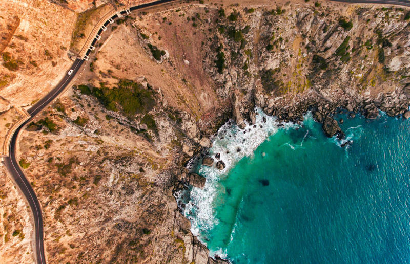 Bird's-eye views you won't believe are real, Konditaget Luders, Copenhagen, Denmark, Ajuda Botanical Garden, Lisbon, Portugal, Henningsvaer football pitch, Lofoten Islands, Norway, Guanajuato, Mexico, Innis Chonnel Castle, Loch Awe, Scotland, Tegallalang rice terraces, Indonesia, Hong Kong, Salt Pans, Gozo, Malta, Shark Fin Cove, Davenport, California, USA, Koh Lipe, Thailand, Golden Gate Bridge, San Francisco, California, USA, Grace Bay, Turks and Caicos Islands, Namib Desert, Namibia, Transfagarasan, Romania, Niagara Falls, Canada/USA, New York City, New York, USA, Road near Laki Volcano, Iceland, Atacama Desert, Chile, San Francisco, California, USA, Na Pali Coast State Wilderness Park, Kauai Island, Hawaii, USA, Yan'an Elevated Road Interchange, Shanghai, China, Navagio Beach, Zakynthos, Greece, Forests around Berthoud Pass, Colorado, USA, Maasai Mara National Reserve, Kenya, Estrada Marginal Norte, Peniche, Portugal, Twelve Apostles, Victoria, Australia, Wongwian Yai, Bangkok, Thailand, Choui Fong Tea Farm, Thailand, Rogers Centre, Toronto, Canada, Silhouette Island, Seychelles, Richfield County Park, Davison, Michigan, USA, Fez, Morocco, Cleopatra Beach, Turkey, Okavango Delta, Botswana, Ningaloo Marine Park, Exmouth, Australia, Mekong Delta, Vietnam, Copacabana Beach, Rio de Janeiro, Brazil, Rheinschlucht, Versam, Switzerland, Colonia de Sant Jordi, Ses Salines, Mallorca, Spain, Sheikh Zayed Road Interchange 1, Dubai, UAE, Zhangye National Geopark, China, Lavender fields in Provence, France, Shifen Waterfall, Taiwan, Misfat Al Abriyeen, Oman, Dubrovnik, Croatia, Clarence Battery, Guernsey, UK, Hverir Geothermal Area, Iceland, Chapman Peak Drive, Cape Town, South Africa, Ronda, Malaga, Spain, Jokulsarlon, Iceland, Rub' Al Khali, Arabian Desert, Vaavu Atoll, Maldives, Bled Island, Slovenia, Gorreana Tea Factory, the Azores, Portugal, Pyrgos Kallistis, Santorini, Greece, Croyde Bay, Devon, UK, Bay of Kotor, Montenegro, Joffre Lakes Provincial Park, Canada, Grand Prismatic Spring, Yellowstone National Park, Wyoming, USA