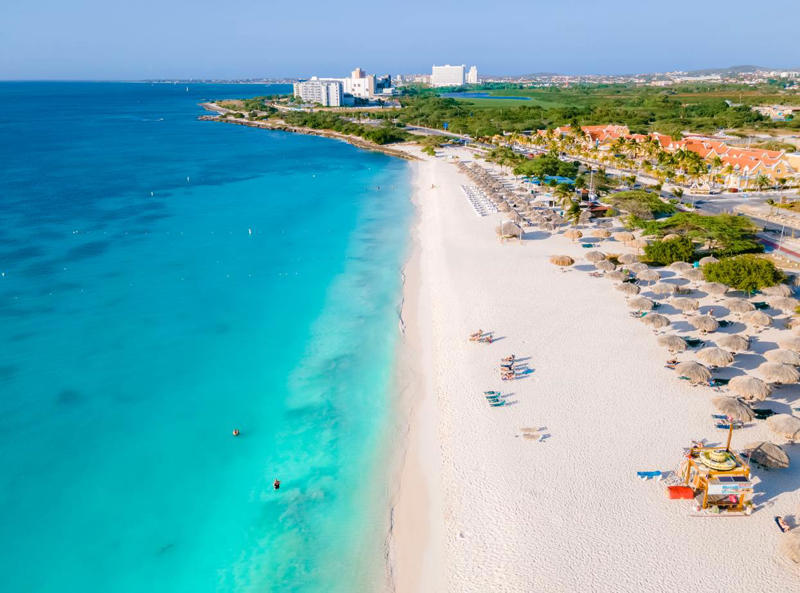 49. Eagle Beach - Aruba 50. Rabbit Beach - Italy, 49. Eagle Beach - Aruba, 48. Kynance Cove - United Kingdom, 47. Varadero Beach - Cuba, 46. Cathedral Cove Beach - New Zealand, 45. Bon Bon Beach - Philippines, 44. Henderson Beach - Florida, United States, 43. Cayo Levantado - Dominican Republic, 42. Pipe Creek Sandbar - Bahamas, 41. Diamond Beach - Iceland, 40. Kapalua Bay Beach - Hawaii, United States, 39. Kelingking Beach - Indonesia, 38. Playa Xpu Ha - Mexico, 37. Colombier Beach - St Barth, 36. Kelebekler Vadisi - Turkey, 35. Baia do Sancho - Brazil, 34. Grand Anse - Grenada, 33. Wharton Beach - Australia, 32. Boulders Beach - South Africa, 31. Cayo Zapatilla - Panama, 30. Maundays Bay - Anguilla, 29. Fteri Beach - Greece, 28. Horseshoe Bay - Bermuda, 27. Grote Knip - Curaçao, 26. Seven Mile Beach - Cayman Islands, 25. Praia da Marinha - Portugal, 24. Cayo de Agua - Venezuela, 23. Freedom Beach - Thailand, 22. Anse Source D'Argent - Seychelles, 21. Gardner Bay - Ecuador, 20. Anchor Bay Beach - Australia, 19. Cala Goloritze - Italy, 18. Puinn Sand Beach - Norway, 17. Grace Bay - Turks and Caicos, 16. Playa Balandra - Mexico, 15. One Foot Island - Cook Islands, 14. Lanikai Beach - Hawaii, United States, 13. Aharen Beach - Japan, 12. Le Morne Beach - Mauritius, 11. Calo des Moro - Spain, 10. Horse Shoe Island - Myanmar, 09. Green Lagoon - French Polynesia, 08. Anse Georgette - Seychelles, 07. Pink Beach - Indonesia, 06. Turquoise Bay - Australia, 05. Voutoumi Beach - Greece, 04. Entalula Beach - Philippines, 03. Meads Bay - Anguilla, 02. Cala Mariolu - Italy, 01. Trunk Bay, St. John - US Virgin Islands
