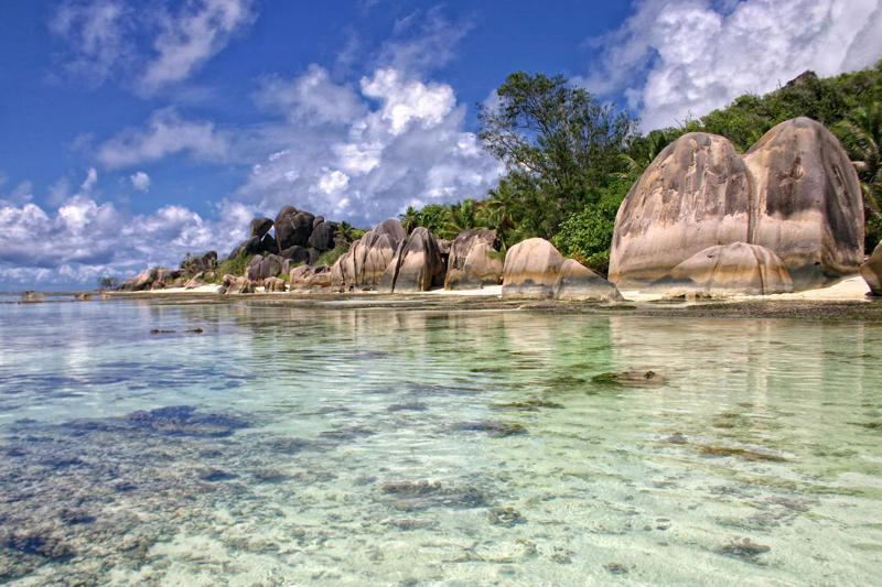 22. Anse Source D'Argent - Seychelles 50. Rabbit Beach - Italy, 49. Eagle Beach - Aruba, 48. Kynance Cove - United Kingdom, 47. Varadero Beach - Cuba, 46. Cathedral Cove Beach - New Zealand, 45. Bon Bon Beach - Philippines, 44. Henderson Beach - Florida, United States, 43. Cayo Levantado - Dominican Republic, 42. Pipe Creek Sandbar - Bahamas, 41. Diamond Beach - Iceland, 40. Kapalua Bay Beach - Hawaii, United States, 39. Kelingking Beach - Indonesia, 38. Playa Xpu Ha - Mexico, 37. Colombier Beach - St Barth, 36. Kelebekler Vadisi - Turkey, 35. Baia do Sancho - Brazil, 34. Grand Anse - Grenada, 33. Wharton Beach - Australia, 32. Boulders Beach - South Africa, 31. Cayo Zapatilla - Panama, 30. Maundays Bay - Anguilla, 29. Fteri Beach - Greece, 28. Horseshoe Bay - Bermuda, 27. Grote Knip - Curaçao, 26. Seven Mile Beach - Cayman Islands, 25. Praia da Marinha - Portugal, 24. Cayo de Agua - Venezuela, 23. Freedom Beach - Thailand, 22. Anse Source D'Argent - Seychelles, 21. Gardner Bay - Ecuador, 20. Anchor Bay Beach - Australia, 19. Cala Goloritze - Italy, 18. Puinn Sand Beach - Norway, 17. Grace Bay - Turks and Caicos, 16. Playa Balandra - Mexico, 15. One Foot Island - Cook Islands, 14. Lanikai Beach - Hawaii, United States, 13. Aharen Beach - Japan, 12. Le Morne Beach - Mauritius, 11. Calo des Moro - Spain, 10. Horse Shoe Island - Myanmar, 09. Green Lagoon - French Polynesia, 08. Anse Georgette - Seychelles, 07. Pink Beach - Indonesia, 06. Turquoise Bay - Australia, 05. Voutoumi Beach - Greece, 04. Entalula Beach - Philippines, 03. Meads Bay - Anguilla, 02. Cala Mariolu - Italy, 01. Trunk Bay, St. John - US Virgin Islands