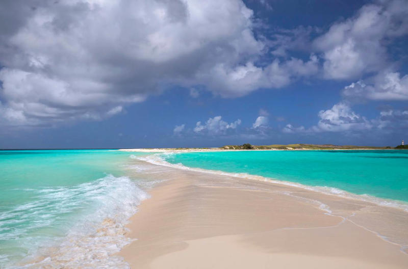 24. Cayo de Agua - Venezuela 50. Rabbit Beach - Italy, 49. Eagle Beach - Aruba, 48. Kynance Cove - United Kingdom, 47. Varadero Beach - Cuba, 46. Cathedral Cove Beach - New Zealand, 45. Bon Bon Beach - Philippines, 44. Henderson Beach - Florida, United States, 43. Cayo Levantado - Dominican Republic, 42. Pipe Creek Sandbar - Bahamas, 41. Diamond Beach - Iceland, 40. Kapalua Bay Beach - Hawaii, United States, 39. Kelingking Beach - Indonesia, 38. Playa Xpu Ha - Mexico, 37. Colombier Beach - St Barth, 36. Kelebekler Vadisi - Turkey, 35. Baia do Sancho - Brazil, 34. Grand Anse - Grenada, 33. Wharton Beach - Australia, 32. Boulders Beach - South Africa, 31. Cayo Zapatilla - Panama, 30. Maundays Bay - Anguilla, 29. Fteri Beach - Greece, 28. Horseshoe Bay - Bermuda, 27. Grote Knip - Curaçao, 26. Seven Mile Beach - Cayman Islands, 25. Praia da Marinha - Portugal, 24. Cayo de Agua - Venezuela, 23. Freedom Beach - Thailand, 22. Anse Source D'Argent - Seychelles, 21. Gardner Bay - Ecuador, 20. Anchor Bay Beach - Australia, 19. Cala Goloritze - Italy, 18. Puinn Sand Beach - Norway, 17. Grace Bay - Turks and Caicos, 16. Playa Balandra - Mexico, 15. One Foot Island - Cook Islands, 14. Lanikai Beach - Hawaii, United States, 13. Aharen Beach - Japan, 12. Le Morne Beach - Mauritius, 11. Calo des Moro - Spain, 10. Horse Shoe Island - Myanmar, 09. Green Lagoon - French Polynesia, 08. Anse Georgette - Seychelles, 07. Pink Beach - Indonesia, 06. Turquoise Bay - Australia, 05. Voutoumi Beach - Greece, 04. Entalula Beach - Philippines, 03. Meads Bay - Anguilla, 02. Cala Mariolu - Italy, 01. Trunk Bay, St. John - US Virgin Islands