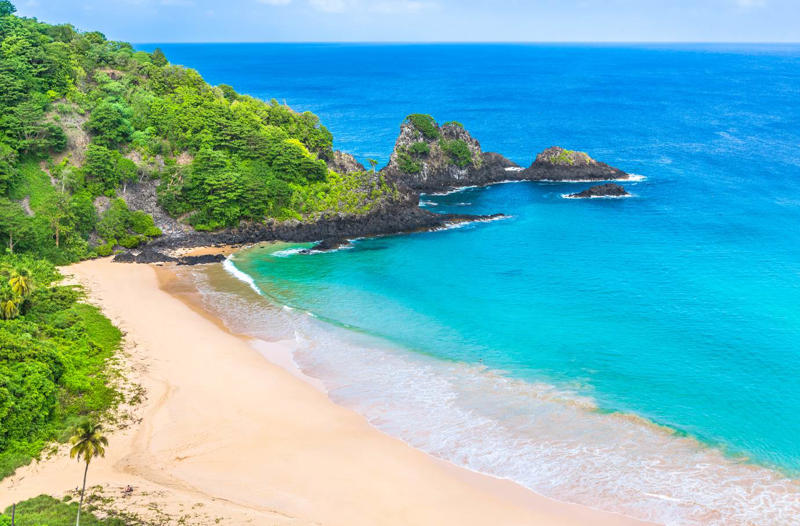 35. Baia do Sancho - Brazil 50. Rabbit Beach - Italy, 49. Eagle Beach - Aruba, 48. Kynance Cove - United Kingdom, 47. Varadero Beach - Cuba, 46. Cathedral Cove Beach - New Zealand, 45. Bon Bon Beach - Philippines, 44. Henderson Beach - Florida, United States, 43. Cayo Levantado - Dominican Republic, 42. Pipe Creek Sandbar - Bahamas, 41. Diamond Beach - Iceland, 40. Kapalua Bay Beach - Hawaii, United States, 39. Kelingking Beach - Indonesia, 38. Playa Xpu Ha - Mexico, 37. Colombier Beach - St Barth, 36. Kelebekler Vadisi - Turkey, 35. Baia do Sancho - Brazil, 34. Grand Anse - Grenada, 33. Wharton Beach - Australia, 32. Boulders Beach - South Africa, 31. Cayo Zapatilla - Panama, 30. Maundays Bay - Anguilla, 29. Fteri Beach - Greece, 28. Horseshoe Bay - Bermuda, 27. Grote Knip - Curaçao, 26. Seven Mile Beach - Cayman Islands, 25. Praia da Marinha - Portugal, 24. Cayo de Agua - Venezuela, 23. Freedom Beach - Thailand, 22. Anse Source D'Argent - Seychelles, 21. Gardner Bay - Ecuador, 20. Anchor Bay Beach - Australia, 19. Cala Goloritze - Italy, 18. Puinn Sand Beach - Norway, 17. Grace Bay - Turks and Caicos, 16. Playa Balandra - Mexico, 15. One Foot Island - Cook Islands, 14. Lanikai Beach - Hawaii, United States, 13. Aharen Beach - Japan, 12. Le Morne Beach - Mauritius, 11. Calo des Moro - Spain, 10. Horse Shoe Island - Myanmar, 09. Green Lagoon - French Polynesia, 08. Anse Georgette - Seychelles, 07. Pink Beach - Indonesia, 06. Turquoise Bay - Australia, 05. Voutoumi Beach - Greece, 04. Entalula Beach - Philippines, 03. Meads Bay - Anguilla, 02. Cala Mariolu - Italy, 01. Trunk Bay, St. John - US Virgin Islands