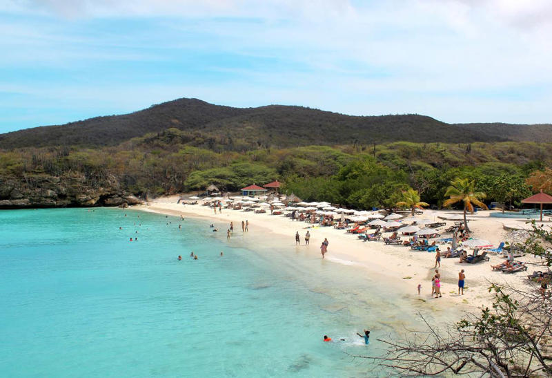 27. Grote Knip - Curaçao 50. Rabbit Beach - Italy, 49. Eagle Beach - Aruba, 48. Kynance Cove - United Kingdom, 47. Varadero Beach - Cuba, 46. Cathedral Cove Beach - New Zealand, 45. Bon Bon Beach - Philippines, 44. Henderson Beach - Florida, United States, 43. Cayo Levantado - Dominican Republic, 42. Pipe Creek Sandbar - Bahamas, 41. Diamond Beach - Iceland, 40. Kapalua Bay Beach - Hawaii, United States, 39. Kelingking Beach - Indonesia, 38. Playa Xpu Ha - Mexico, 37. Colombier Beach - St Barth, 36. Kelebekler Vadisi - Turkey, 35. Baia do Sancho - Brazil, 34. Grand Anse - Grenada, 33. Wharton Beach - Australia, 32. Boulders Beach - South Africa, 31. Cayo Zapatilla - Panama, 30. Maundays Bay - Anguilla, 29. Fteri Beach - Greece, 28. Horseshoe Bay - Bermuda, 27. Grote Knip - Curaçao, 26. Seven Mile Beach - Cayman Islands, 25. Praia da Marinha - Portugal, 24. Cayo de Agua - Venezuela, 23. Freedom Beach - Thailand, 22. Anse Source D'Argent - Seychelles, 21. Gardner Bay - Ecuador, 20. Anchor Bay Beach - Australia, 19. Cala Goloritze - Italy, 18. Puinn Sand Beach - Norway, 17. Grace Bay - Turks and Caicos, 16. Playa Balandra - Mexico, 15. One Foot Island - Cook Islands, 14. Lanikai Beach - Hawaii, United States, 13. Aharen Beach - Japan, 12. Le Morne Beach - Mauritius, 11. Calo des Moro - Spain, 10. Horse Shoe Island - Myanmar, 09. Green Lagoon - French Polynesia, 08. Anse Georgette - Seychelles, 07. Pink Beach - Indonesia, 06. Turquoise Bay - Australia, 05. Voutoumi Beach - Greece, 04. Entalula Beach - Philippines, 03. Meads Bay - Anguilla, 02. Cala Mariolu - Italy, 01. Trunk Bay, St. John - US Virgin Islands