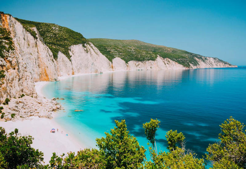 29. Fteri Beach - Greece 50. Rabbit Beach - Italy, 49. Eagle Beach - Aruba, 48. Kynance Cove - United Kingdom, 47. Varadero Beach - Cuba, 46. Cathedral Cove Beach - New Zealand, 45. Bon Bon Beach - Philippines, 44. Henderson Beach - Florida, United States, 43. Cayo Levantado - Dominican Republic, 42. Pipe Creek Sandbar - Bahamas, 41. Diamond Beach - Iceland, 40. Kapalua Bay Beach - Hawaii, United States, 39. Kelingking Beach - Indonesia, 38. Playa Xpu Ha - Mexico, 37. Colombier Beach - St Barth, 36. Kelebekler Vadisi - Turkey, 35. Baia do Sancho - Brazil, 34. Grand Anse - Grenada, 33. Wharton Beach - Australia, 32. Boulders Beach - South Africa, 31. Cayo Zapatilla - Panama, 30. Maundays Bay - Anguilla, 29. Fteri Beach - Greece, 28. Horseshoe Bay - Bermuda, 27. Grote Knip - Curaçao, 26. Seven Mile Beach - Cayman Islands, 25. Praia da Marinha - Portugal, 24. Cayo de Agua - Venezuela, 23. Freedom Beach - Thailand, 22. Anse Source D'Argent - Seychelles, 21. Gardner Bay - Ecuador, 20. Anchor Bay Beach - Australia, 19. Cala Goloritze - Italy, 18. Puinn Sand Beach - Norway, 17. Grace Bay - Turks and Caicos, 16. Playa Balandra - Mexico, 15. One Foot Island - Cook Islands, 14. Lanikai Beach - Hawaii, United States, 13. Aharen Beach - Japan, 12. Le Morne Beach - Mauritius, 11. Calo des Moro - Spain, 10. Horse Shoe Island - Myanmar, 09. Green Lagoon - French Polynesia, 08. Anse Georgette - Seychelles, 07. Pink Beach - Indonesia, 06. Turquoise Bay - Australia, 05. Voutoumi Beach - Greece, 04. Entalula Beach - Philippines, 03. Meads Bay - Anguilla, 02. Cala Mariolu - Italy, 01. Trunk Bay, St. John - US Virgin Islands