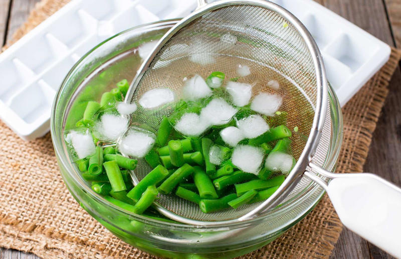 39. Blanch your vegetables 67. Give breadcrumbs extra flavour, 66. Improve a boxed cake mix, 65. Warm a knife for neat slicing, 64. Make French toast in the slow cooker, 63. Ripen bananas slowly with a banana hanger, 62. Make dressing with almost-empty jars, 61. Use overripe bananas for the best banana bread, 60. Use vegetable water in gravy, 59. Add nutritional yeast for a cheesy flavour, 58. Combine miso and butter for a flavour hit, 57. Make frozen coffee cubes, 56. Pair your pasta and sauce correctly, 55. Keep baked goods soft with a slice of bread, 54. Use ice cube trays to freeze leftover sauce, 53. Use an ice cream scoop for meatballs, 52. Add sugar to savoury dishes and salt to sweet, 51. Peel tomatoes like a pro, 50. Prep ahead for smoothies, 49. Apply baking soda to stained food storage containers, 48. Try the hedgehog mango trick, 47. Stop syrup sticking to your spoons, 46. Use carbonated drinks for lighter batter, 45. Be creative with ketchup, 44. Buy ovenproof storage containers, 43. Sweeten tomato sauce with a carrot, 42. Make and freeze breakfast burritos, 41. Bulk out sauces with lentils, 40. Mix it up with a mug omelette, 39. Blanch your vegetables, 38. Use orange juice in marinades, 37. Put pasta water to good use, 36. Add beetroot to brownies, 35. Use a cupcake tin for egg muffins, 34. Roast potatoes in mayonnaise, 33. Raise your mac 'n' cheese game with mustard, 32. Score meat skin, 31. Ditch the oven for mug cakes, 30. Freeze fresh ginger, 29. Massage kale, 28. Use bread to stop your sugar clumping, 27. Froth milk the easy way, 26. Say yes to soy sauce on popcorn, 25. Use the microwave to peel garlic, 24. Cook bacon in the microwave, 23. Stop soggy sandwiches, 22. Separate onions and potatoes, 21. Use the float test for eggs, 20. Transform cake fails, 19. Use bicarbonate of soda to tenderise meat, 18. Store herby butter in the freezer, 17. Reuse sauce bottles for pancakes, 16. Turn your peanut butter jar upside down, 15. Stop using boiling water for coffee, 14. Use a hand mixer for mashed potatoes, 13. Microwave pizza with water, 12. Grate butter for easy spreading, 11. Microwave lemons to get more juice, 10. Make hash browns in your waffle iron, 9. Use a wine bottle as a rolling pin, 8. Use mayonnaise for perfect toasties, 7. Revive old bread with water, 6. Use your microwave for baked potatoes, 5. Rescue burnt biscuits with a grater, 4. Salvage split Hollandaise, 3. Poach eggs in cling film, 2. Store herbs like flowers