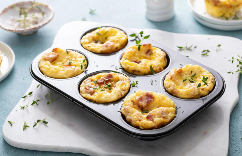 35. Use a cupcake tin for egg muffins 67. Give breadcrumbs extra flavour, 66. Improve a boxed cake mix, 65. Warm a knife for neat slicing, 64. Make French toast in the slow cooker, 63. Ripen bananas slowly with a banana hanger, 62. Make dressing with almost-empty jars, 61. Use overripe bananas for the best banana bread, 60. Use vegetable water in gravy, 59. Add nutritional yeast for a cheesy flavour, 58. Combine miso and butter for a flavour hit, 57. Make frozen coffee cubes, 56. Pair your pasta and sauce correctly, 55. Keep baked goods soft with a slice of bread, 54. Use ice cube trays to freeze leftover sauce, 53. Use an ice cream scoop for meatballs, 52. Add sugar to savoury dishes and salt to sweet, 51. Peel tomatoes like a pro, 50. Prep ahead for smoothies, 49. Apply baking soda to stained food storage containers, 48. Try the hedgehog mango trick, 47. Stop syrup sticking to your spoons, 46. Use carbonated drinks for lighter batter, 45. Be creative with ketchup, 44. Buy ovenproof storage containers, 43. Sweeten tomato sauce with a carrot, 42. Make and freeze breakfast burritos, 41. Bulk out sauces with lentils, 40. Mix it up with a mug omelette, 39. Blanch your vegetables, 38. Use orange juice in marinades, 37. Put pasta water to good use, 36. Add beetroot to brownies, 35. Use a cupcake tin for egg muffins, 34. Roast potatoes in mayonnaise, 33. Raise your mac 'n' cheese game with mustard, 32. Score meat skin, 31. Ditch the oven for mug cakes, 30. Freeze fresh ginger, 29. Massage kale, 28. Use bread to stop your sugar clumping, 27. Froth milk the easy way, 26. Say yes to soy sauce on popcorn, 25. Use the microwave to peel garlic, 24. Cook bacon in the microwave, 23. Stop soggy sandwiches, 22. Separate onions and potatoes, 21. Use the float test for eggs, 20. Transform cake fails, 19. Use bicarbonate of soda to tenderise meat, 18. Store herby butter in the freezer, 17. Reuse sauce bottles for pancakes, 16. Turn your peanut butter jar upside down, 15. Stop using boiling water for coffee, 14. Use a hand mixer for mashed potatoes, 13. Microwave pizza with water, 12. Grate butter for easy spreading, 11. Microwave lemons to get more juice, 10. Make hash browns in your waffle iron, 9. Use a wine bottle as a rolling pin, 8. Use mayonnaise for perfect toasties, 7. Revive old bread with water, 6. Use your microwave for baked potatoes, 5. Rescue burnt biscuits with a grater, 4. Salvage split Hollandaise, 3. Poach eggs in cling film, 2. Store herbs like flowers