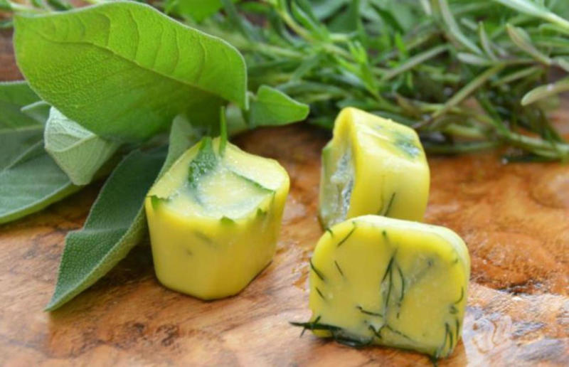 18. Store herby butter in the freezer 67. Give breadcrumbs extra flavour, 66. Improve a boxed cake mix, 65. Warm a knife for neat slicing, 64. Make French toast in the slow cooker, 63. Ripen bananas slowly with a banana hanger, 62. Make dressing with almost-empty jars, 61. Use overripe bananas for the best banana bread, 60. Use vegetable water in gravy, 59. Add nutritional yeast for a cheesy flavour, 58. Combine miso and butter for a flavour hit, 57. Make frozen coffee cubes, 56. Pair your pasta and sauce correctly, 55. Keep baked goods soft with a slice of bread, 54. Use ice cube trays to freeze leftover sauce, 53. Use an ice cream scoop for meatballs, 52. Add sugar to savoury dishes and salt to sweet, 51. Peel tomatoes like a pro, 50. Prep ahead for smoothies, 49. Apply baking soda to stained food storage containers, 48. Try the hedgehog mango trick, 47. Stop syrup sticking to your spoons, 46. Use carbonated drinks for lighter batter, 45. Be creative with ketchup, 44. Buy ovenproof storage containers, 43. Sweeten tomato sauce with a carrot, 42. Make and freeze breakfast burritos, 41. Bulk out sauces with lentils, 40. Mix it up with a mug omelette, 39. Blanch your vegetables, 38. Use orange juice in marinades, 37. Put pasta water to good use, 36. Add beetroot to brownies, 35. Use a cupcake tin for egg muffins, 34. Roast potatoes in mayonnaise, 33. Raise your mac 'n' cheese game with mustard, 32. Score meat skin, 31. Ditch the oven for mug cakes, 30. Freeze fresh ginger, 29. Massage kale, 28. Use bread to stop your sugar clumping, 27. Froth milk the easy way, 26. Say yes to soy sauce on popcorn, 25. Use the microwave to peel garlic, 24. Cook bacon in the microwave, 23. Stop soggy sandwiches, 22. Separate onions and potatoes, 21. Use the float test for eggs, 20. Transform cake fails, 19. Use bicarbonate of soda to tenderise meat, 18. Store herby butter in the freezer, 17. Reuse sauce bottles for pancakes, 16. Turn your peanut butter jar upside down, 15. Stop using boiling water for coffee, 14. Use a hand mixer for mashed potatoes, 13. Microwave pizza with water, 12. Grate butter for easy spreading, 11. Microwave lemons to get more juice, 10. Make hash browns in your waffle iron, 9. Use a wine bottle as a rolling pin, 8. Use mayonnaise for perfect toasties, 7. Revive old bread with water, 6. Use your microwave for baked potatoes, 5. Rescue burnt biscuits with a grater, 4. Salvage split Hollandaise, 3. Poach eggs in cling film, 2. Store herbs like flowers