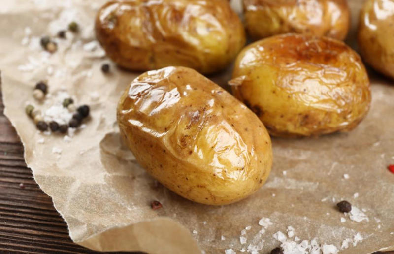 6. Use your microwave for baked potatoes 67. Give breadcrumbs extra flavour, 66. Improve a boxed cake mix, 65. Warm a knife for neat slicing, 64. Make French toast in the slow cooker, 63. Ripen bananas slowly with a banana hanger, 62. Make dressing with almost-empty jars, 61. Use overripe bananas for the best banana bread, 60. Use vegetable water in gravy, 59. Add nutritional yeast for a cheesy flavour, 58. Combine miso and butter for a flavour hit, 57. Make frozen coffee cubes, 56. Pair your pasta and sauce correctly, 55. Keep baked goods soft with a slice of bread, 54. Use ice cube trays to freeze leftover sauce, 53. Use an ice cream scoop for meatballs, 52. Add sugar to savoury dishes and salt to sweet, 51. Peel tomatoes like a pro, 50. Prep ahead for smoothies, 49. Apply baking soda to stained food storage containers, 48. Try the hedgehog mango trick, 47. Stop syrup sticking to your spoons, 46. Use carbonated drinks for lighter batter, 45. Be creative with ketchup, 44. Buy ovenproof storage containers, 43. Sweeten tomato sauce with a carrot, 42. Make and freeze breakfast burritos, 41. Bulk out sauces with lentils, 40. Mix it up with a mug omelette, 39. Blanch your vegetables, 38. Use orange juice in marinades, 37. Put pasta water to good use, 36. Add beetroot to brownies, 35. Use a cupcake tin for egg muffins, 34. Roast potatoes in mayonnaise, 33. Raise your mac 'n' cheese game with mustard, 32. Score meat skin, 31. Ditch the oven for mug cakes, 30. Freeze fresh ginger, 29. Massage kale, 28. Use bread to stop your sugar clumping, 27. Froth milk the easy way, 26. Say yes to soy sauce on popcorn, 25. Use the microwave to peel garlic, 24. Cook bacon in the microwave, 23. Stop soggy sandwiches, 22. Separate onions and potatoes, 21. Use the float test for eggs, 20. Transform cake fails, 19. Use bicarbonate of soda to tenderise meat, 18. Store herby butter in the freezer, 17. Reuse sauce bottles for pancakes, 16. Turn your peanut butter jar upside down, 15. Stop using boiling water for coffee, 14. Use a hand mixer for mashed potatoes, 13. Microwave pizza with water, 12. Grate butter for easy spreading, 11. Microwave lemons to get more juice, 10. Make hash browns in your waffle iron, 9. Use a wine bottle as a rolling pin, 8. Use mayonnaise for perfect toasties, 7. Revive old bread with water, 6. Use your microwave for baked potatoes, 5. Rescue burnt biscuits with a grater, 4. Salvage split Hollandaise, 3. Poach eggs in cling film, 2. Store herbs like flowers