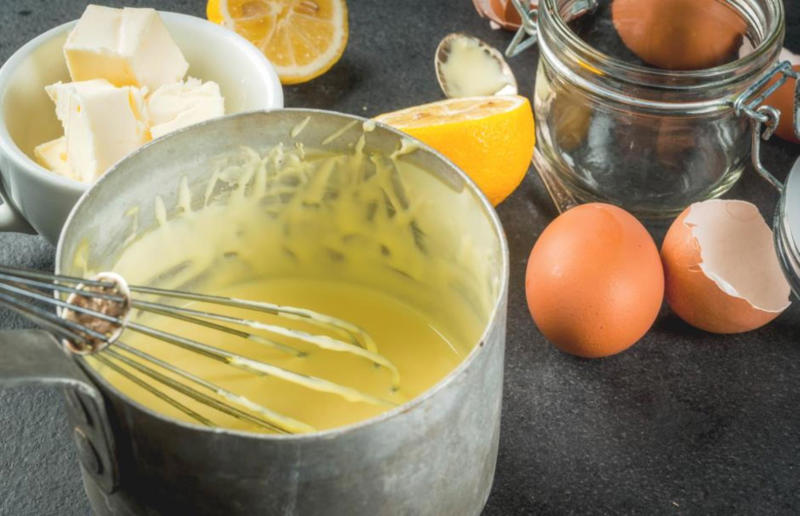 4. Salvage split Hollandaise 67. Give breadcrumbs extra flavour, 66. Improve a boxed cake mix, 65. Warm a knife for neat slicing, 64. Make French toast in the slow cooker, 63. Ripen bananas slowly with a banana hanger, 62. Make dressing with almost-empty jars, 61. Use overripe bananas for the best banana bread, 60. Use vegetable water in gravy, 59. Add nutritional yeast for a cheesy flavour, 58. Combine miso and butter for a flavour hit, 57. Make frozen coffee cubes, 56. Pair your pasta and sauce correctly, 55. Keep baked goods soft with a slice of bread, 54. Use ice cube trays to freeze leftover sauce, 53. Use an ice cream scoop for meatballs, 52. Add sugar to savoury dishes and salt to sweet, 51. Peel tomatoes like a pro, 50. Prep ahead for smoothies, 49. Apply baking soda to stained food storage containers, 48. Try the hedgehog mango trick, 47. Stop syrup sticking to your spoons, 46. Use carbonated drinks for lighter batter, 45. Be creative with ketchup, 44. Buy ovenproof storage containers, 43. Sweeten tomato sauce with a carrot, 42. Make and freeze breakfast burritos, 41. Bulk out sauces with lentils, 40. Mix it up with a mug omelette, 39. Blanch your vegetables, 38. Use orange juice in marinades, 37. Put pasta water to good use, 36. Add beetroot to brownies, 35. Use a cupcake tin for egg muffins, 34. Roast potatoes in mayonnaise, 33. Raise your mac 'n' cheese game with mustard, 32. Score meat skin, 31. Ditch the oven for mug cakes, 30. Freeze fresh ginger, 29. Massage kale, 28. Use bread to stop your sugar clumping, 27. Froth milk the easy way, 26. Say yes to soy sauce on popcorn, 25. Use the microwave to peel garlic, 24. Cook bacon in the microwave, 23. Stop soggy sandwiches, 22. Separate onions and potatoes, 21. Use the float test for eggs, 20. Transform cake fails, 19. Use bicarbonate of soda to tenderise meat, 18. Store herby butter in the freezer, 17. Reuse sauce bottles for pancakes, 16. Turn your peanut butter jar upside down, 15. Stop using boiling water for coffee, 14. Use a hand mixer for mashed potatoes, 13. Microwave pizza with water, 12. Grate butter for easy spreading, 11. Microwave lemons to get more juice, 10. Make hash browns in your waffle iron, 9. Use a wine bottle as a rolling pin, 8. Use mayonnaise for perfect toasties, 7. Revive old bread with water, 6. Use your microwave for baked potatoes, 5. Rescue burnt biscuits with a grater, 4. Salvage split Hollandaise, 3. Poach eggs in cling film, 2. Store herbs like flowers