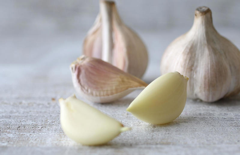 25. Use the microwave to peel garlic 67. Give breadcrumbs extra flavour, 66. Improve a boxed cake mix, 65. Warm a knife for neat slicing, 64. Make French toast in the slow cooker, 63. Ripen bananas slowly with a banana hanger, 62. Make dressing with almost-empty jars, 61. Use overripe bananas for the best banana bread, 60. Use vegetable water in gravy, 59. Add nutritional yeast for a cheesy flavour, 58. Combine miso and butter for a flavour hit, 57. Make frozen coffee cubes, 56. Pair your pasta and sauce correctly, 55. Keep baked goods soft with a slice of bread, 54. Use ice cube trays to freeze leftover sauce, 53. Use an ice cream scoop for meatballs, 52. Add sugar to savoury dishes and salt to sweet, 51. Peel tomatoes like a pro, 50. Prep ahead for smoothies, 49. Apply baking soda to stained food storage containers, 48. Try the hedgehog mango trick, 47. Stop syrup sticking to your spoons, 46. Use carbonated drinks for lighter batter, 45. Be creative with ketchup, 44. Buy ovenproof storage containers, 43. Sweeten tomato sauce with a carrot, 42. Make and freeze breakfast burritos, 41. Bulk out sauces with lentils, 40. Mix it up with a mug omelette, 39. Blanch your vegetables, 38. Use orange juice in marinades, 37. Put pasta water to good use, 36. Add beetroot to brownies, 35. Use a cupcake tin for egg muffins, 34. Roast potatoes in mayonnaise, 33. Raise your mac 'n' cheese game with mustard, 32. Score meat skin, 31. Ditch the oven for mug cakes, 30. Freeze fresh ginger, 29. Massage kale, 28. Use bread to stop your sugar clumping, 27. Froth milk the easy way, 26. Say yes to soy sauce on popcorn, 25. Use the microwave to peel garlic, 24. Cook bacon in the microwave, 23. Stop soggy sandwiches, 22. Separate onions and potatoes, 21. Use the float test for eggs, 20. Transform cake fails, 19. Use bicarbonate of soda to tenderise meat, 18. Store herby butter in the freezer, 17. Reuse sauce bottles for pancakes, 16. Turn your peanut butter jar upside down, 15. Stop using boiling water for coffee, 14. Use a hand mixer for mashed potatoes, 13. Microwave pizza with water, 12. Grate butter for easy spreading, 11. Microwave lemons to get more juice, 10. Make hash browns in your waffle iron, 9. Use a wine bottle as a rolling pin, 8. Use mayonnaise for perfect toasties, 7. Revive old bread with water, 6. Use your microwave for baked potatoes, 5. Rescue burnt biscuits with a grater, 4. Salvage split Hollandaise, 3. Poach eggs in cling film, 2. Store herbs like flowers