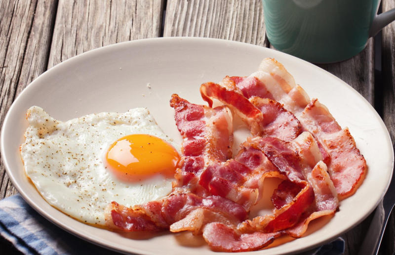24. Cook bacon in the microwave 67. Give breadcrumbs extra flavour, 66. Improve a boxed cake mix, 65. Warm a knife for neat slicing, 64. Make French toast in the slow cooker, 63. Ripen bananas slowly with a banana hanger, 62. Make dressing with almost-empty jars, 61. Use overripe bananas for the best banana bread, 60. Use vegetable water in gravy, 59. Add nutritional yeast for a cheesy flavour, 58. Combine miso and butter for a flavour hit, 57. Make frozen coffee cubes, 56. Pair your pasta and sauce correctly, 55. Keep baked goods soft with a slice of bread, 54. Use ice cube trays to freeze leftover sauce, 53. Use an ice cream scoop for meatballs, 52. Add sugar to savoury dishes and salt to sweet, 51. Peel tomatoes like a pro, 50. Prep ahead for smoothies, 49. Apply baking soda to stained food storage containers, 48. Try the hedgehog mango trick, 47. Stop syrup sticking to your spoons, 46. Use carbonated drinks for lighter batter, 45. Be creative with ketchup, 44. Buy ovenproof storage containers, 43. Sweeten tomato sauce with a carrot, 42. Make and freeze breakfast burritos, 41. Bulk out sauces with lentils, 40. Mix it up with a mug omelette, 39. Blanch your vegetables, 38. Use orange juice in marinades, 37. Put pasta water to good use, 36. Add beetroot to brownies, 35. Use a cupcake tin for egg muffins, 34. Roast potatoes in mayonnaise, 33. Raise your mac 'n' cheese game with mustard, 32. Score meat skin, 31. Ditch the oven for mug cakes, 30. Freeze fresh ginger, 29. Massage kale, 28. Use bread to stop your sugar clumping, 27. Froth milk the easy way, 26. Say yes to soy sauce on popcorn, 25. Use the microwave to peel garlic, 24. Cook bacon in the microwave, 23. Stop soggy sandwiches, 22. Separate onions and potatoes, 21. Use the float test for eggs, 20. Transform cake fails, 19. Use bicarbonate of soda to tenderise meat, 18. Store herby butter in the freezer, 17. Reuse sauce bottles for pancakes, 16. Turn your peanut butter jar upside down, 15. Stop using boiling water for coffee, 14. Use a hand mixer for mashed potatoes, 13. Microwave pizza with water, 12. Grate butter for easy spreading, 11. Microwave lemons to get more juice, 10. Make hash browns in your waffle iron, 9. Use a wine bottle as a rolling pin, 8. Use mayonnaise for perfect toasties, 7. Revive old bread with water, 6. Use your microwave for baked potatoes, 5. Rescue burnt biscuits with a grater, 4. Salvage split Hollandaise, 3. Poach eggs in cling film, 2. Store herbs like flowers