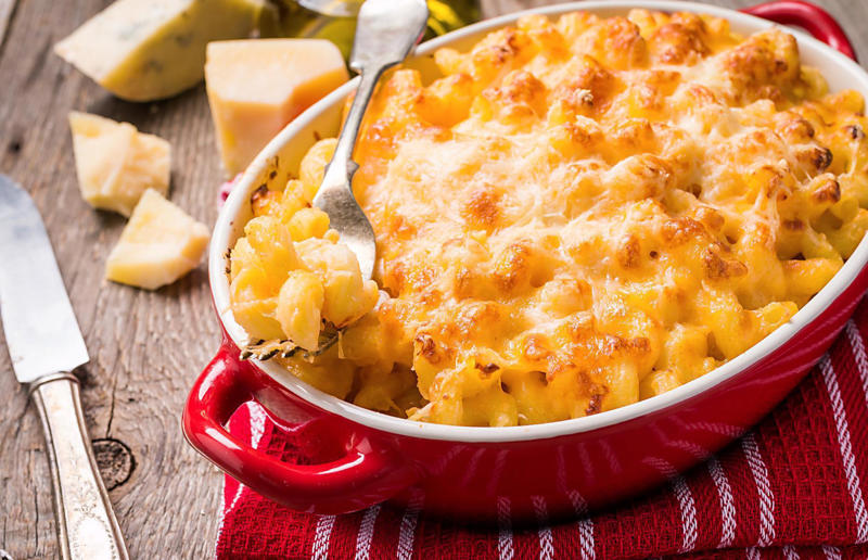 33. Raise your mac 'n' cheese game with mustard 67. Give breadcrumbs extra flavour, 66. Improve a boxed cake mix, 65. Warm a knife for neat slicing, 64. Make French toast in the slow cooker, 63. Ripen bananas slowly with a banana hanger, 62. Make dressing with almost-empty jars, 61. Use overripe bananas for the best banana bread, 60. Use vegetable water in gravy, 59. Add nutritional yeast for a cheesy flavour, 58. Combine miso and butter for a flavour hit, 57. Make frozen coffee cubes, 56. Pair your pasta and sauce correctly, 55. Keep baked goods soft with a slice of bread, 54. Use ice cube trays to freeze leftover sauce, 53. Use an ice cream scoop for meatballs, 52. Add sugar to savoury dishes and salt to sweet, 51. Peel tomatoes like a pro, 50. Prep ahead for smoothies, 49. Apply baking soda to stained food storage containers, 48. Try the hedgehog mango trick, 47. Stop syrup sticking to your spoons, 46. Use carbonated drinks for lighter batter, 45. Be creative with ketchup, 44. Buy ovenproof storage containers, 43. Sweeten tomato sauce with a carrot, 42. Make and freeze breakfast burritos, 41. Bulk out sauces with lentils, 40. Mix it up with a mug omelette, 39. Blanch your vegetables, 38. Use orange juice in marinades, 37. Put pasta water to good use, 36. Add beetroot to brownies, 35. Use a cupcake tin for egg muffins, 34. Roast potatoes in mayonnaise, 33. Raise your mac 'n' cheese game with mustard, 32. Score meat skin, 31. Ditch the oven for mug cakes, 30. Freeze fresh ginger, 29. Massage kale, 28. Use bread to stop your sugar clumping, 27. Froth milk the easy way, 26. Say yes to soy sauce on popcorn, 25. Use the microwave to peel garlic, 24. Cook bacon in the microwave, 23. Stop soggy sandwiches, 22. Separate onions and potatoes, 21. Use the float test for eggs, 20. Transform cake fails, 19. Use bicarbonate of soda to tenderise meat, 18. Store herby butter in the freezer, 17. Reuse sauce bottles for pancakes, 16. Turn your peanut butter jar upside down, 15. Stop using boiling water for coffee, 14. Use a hand mixer for mashed potatoes, 13. Microwave pizza with water, 12. Grate butter for easy spreading, 11. Microwave lemons to get more juice, 10. Make hash browns in your waffle iron, 9. Use a wine bottle as a rolling pin, 8. Use mayonnaise for perfect toasties, 7. Revive old bread with water, 6. Use your microwave for baked potatoes, 5. Rescue burnt biscuits with a grater, 4. Salvage split Hollandaise, 3. Poach eggs in cling film, 2. Store herbs like flowers