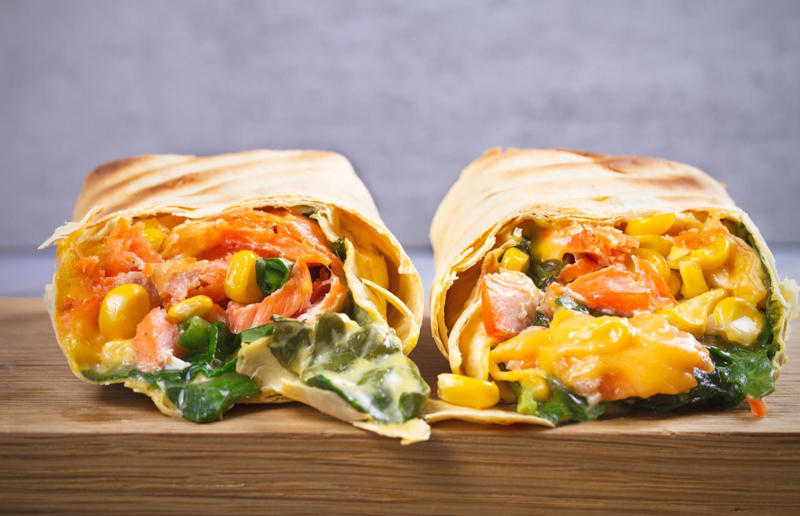 42. Make and freeze breakfast burritos 67. Give breadcrumbs extra flavour, 66. Improve a boxed cake mix, 65. Warm a knife for neat slicing, 64. Make French toast in the slow cooker, 63. Ripen bananas slowly with a banana hanger, 62. Make dressing with almost-empty jars, 61. Use overripe bananas for the best banana bread, 60. Use vegetable water in gravy, 59. Add nutritional yeast for a cheesy flavour, 58. Combine miso and butter for a flavour hit, 57. Make frozen coffee cubes, 56. Pair your pasta and sauce correctly, 55. Keep baked goods soft with a slice of bread, 54. Use ice cube trays to freeze leftover sauce, 53. Use an ice cream scoop for meatballs, 52. Add sugar to savoury dishes and salt to sweet, 51. Peel tomatoes like a pro, 50. Prep ahead for smoothies, 49. Apply baking soda to stained food storage containers, 48. Try the hedgehog mango trick, 47. Stop syrup sticking to your spoons, 46. Use carbonated drinks for lighter batter, 45. Be creative with ketchup, 44. Buy ovenproof storage containers, 43. Sweeten tomato sauce with a carrot, 42. Make and freeze breakfast burritos, 41. Bulk out sauces with lentils, 40. Mix it up with a mug omelette, 39. Blanch your vegetables, 38. Use orange juice in marinades, 37. Put pasta water to good use, 36. Add beetroot to brownies, 35. Use a cupcake tin for egg muffins, 34. Roast potatoes in mayonnaise, 33. Raise your mac 'n' cheese game with mustard, 32. Score meat skin, 31. Ditch the oven for mug cakes, 30. Freeze fresh ginger, 29. Massage kale, 28. Use bread to stop your sugar clumping, 27. Froth milk the easy way, 26. Say yes to soy sauce on popcorn, 25. Use the microwave to peel garlic, 24. Cook bacon in the microwave, 23. Stop soggy sandwiches, 22. Separate onions and potatoes, 21. Use the float test for eggs, 20. Transform cake fails, 19. Use bicarbonate of soda to tenderise meat, 18. Store herby butter in the freezer, 17. Reuse sauce bottles for pancakes, 16. Turn your peanut butter jar upside down, 15. Stop using boiling water for coffee, 14. Use a hand mixer for mashed potatoes, 13. Microwave pizza with water, 12. Grate butter for easy spreading, 11. Microwave lemons to get more juice, 10. Make hash browns in your waffle iron, 9. Use a wine bottle as a rolling pin, 8. Use mayonnaise for perfect toasties, 7. Revive old bread with water, 6. Use your microwave for baked potatoes, 5. Rescue burnt biscuits with a grater, 4. Salvage split Hollandaise, 3. Poach eggs in cling film, 2. Store herbs like flowers