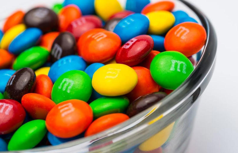 28. M&amp;M’s stands for Mars and Murrie, 27. M&amp;M’s used to contain Hershey chocolate, 26. The idea for M&amp;M’s came from Spain, 25. The first M&amp;M’s factory was in New Jersey, 24. M&amp;M's originally came in cardboard tubes, 23. The original colour selection included violet, 22. M&amp;M’s are stamped with an 'm' so you know they’re the real deal, 21. You’ll never find M&amp;M’s with imperfections, 20. Mars denies that it copied Hershey’s Reese’s Pieces, 19. The red ones disappeared for a decade, 18. M&amp;M’s paid £3.5 million ( million) to be the official snack food of the Olympics, 17. The M&amp;M’s characters were introduced in the 1990s to help sales, 16. M&amp;M’s used the Super Bowl to debut Ms. Brown, 15. There are more varieties than plain, peanut and peanut butter, 14. You can personalise M&amp;M’s, 13. The characters got a makeover, 12. Billions of M&amp;M’s are produced every day, 11. There are M&amp;M’s Worlds in seven major cities, 10. The M&amp;M's mascots retired (briefly) in 2023, 9. Van Halen banned brown M&amp;M's from their dressing room, 8. There are M&amp;M’s boxes with the presidential seal in the White House, 7. M&amp;M’s chocolate takes a long time to make, 6. At first, only the military could have them, 5. M&amp;M’s are the most common chocolate in space, 4. People thought the green ones were aphrodisiacs, 3. Mars once released Jalapeño M&amp;M's, 2. They were banned in Sweden