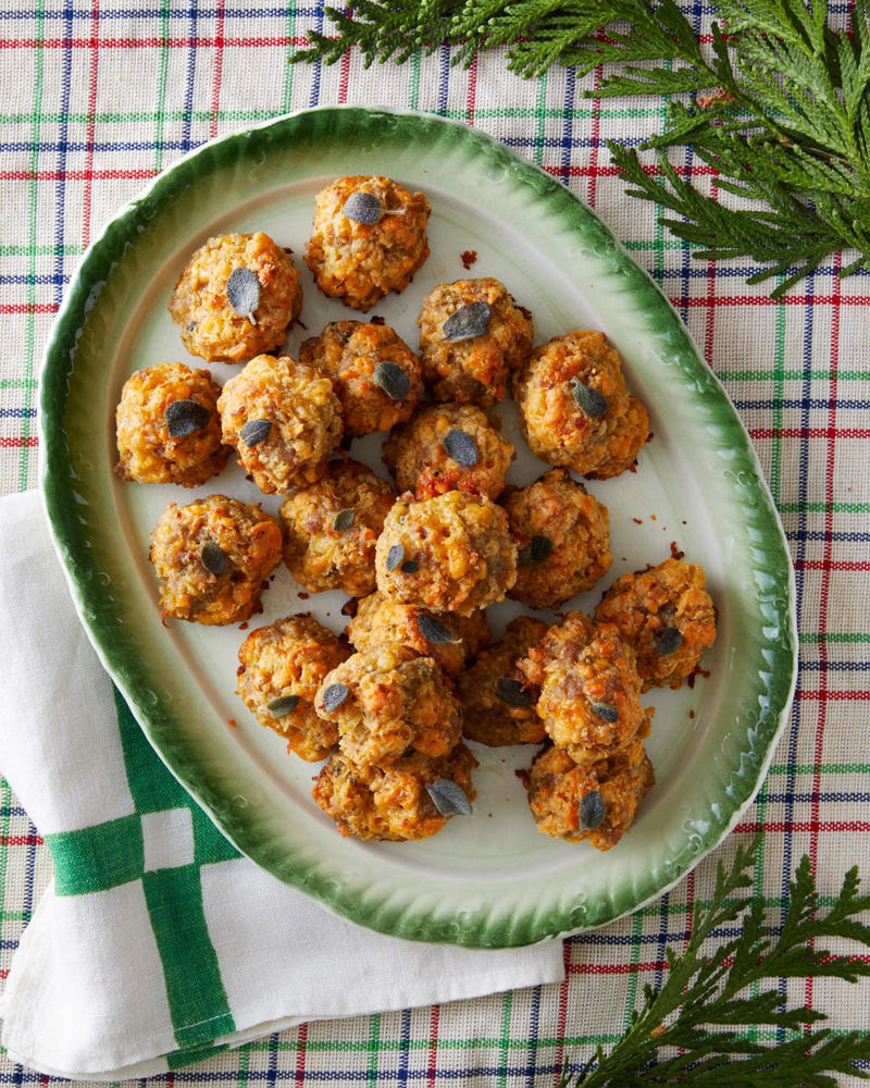 Bacon-Wrapped Stuffed Peppadews, Cheddar Holly Crackers, Christmas Tree Deviled Eggs, Honey-Apple Baked Brie with Fried Sage, Sharp Cheddar Sausage Balls , Warm Crab Dip