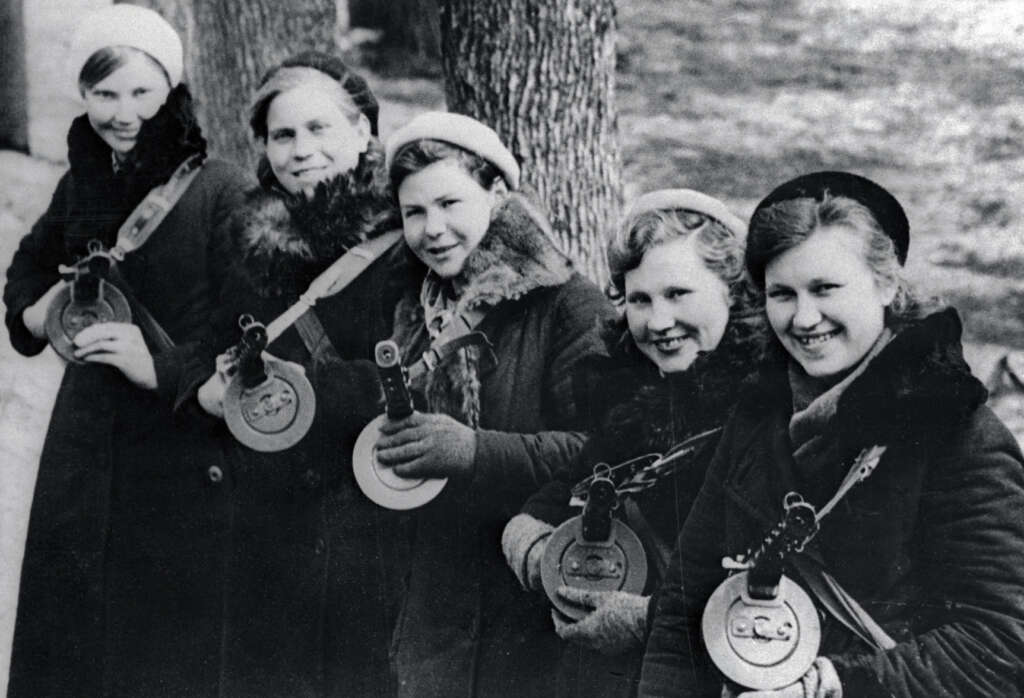 1. "Three boys, including my grandfather (right), find a missing child in a corn field after a town-wide, day-long search in 1942.", 2. "Six-year-old Richard Baranski after winning a contest by eating a 10-inch cranberry pie in 15 seconds in 1948.", 3. "My Grandpa's mugshot when entering a WWII POW camp in the 1940s.", 4. Woman holding a bundle of fresh-picked gladiolus flowers at Terra Ceia Island, Florida, 5. "Here is my Grandma in the late 1940s on vacation.", 6. "A photograph I found hanging inside a small town diner from the 1940s.", 7. "Grand Central Station in 1941", 8. "Margaret Hamilton reuniting with her Wizard of Oz co-star on the set of Twin Beds (1942).", 9. "Disney artists study a deer for Bambi in 1942.", 10. "My weightlifter Great Grandpa holding my grandpa over his head in 1947.", 11. "I never realized Lucille Ball was so hot. Circa 1940s at a bowling alley.", 12. "Civil Air Patrol student pilot at the Silver Lake airfield near Baker, California in 1944.", 13. "My Grandpa selling melons from his car in 1941.", 14. A man begging for his wife's forgiveness inside a Divorce Court in Chicago, 1948, 15. "This was the 'Bicycle of the Future' in 1946", 16. "Two sailors sleeping off their celebration of the end of WWII in 1945.", 17. "The Zoot Suit in the 1940s", 18. Kids dancing in the street in NYC in the 1940s., 19. "A modeling photo of my Great Aunt Frizti (Frances), 1941", 20. "My Grandpa posing with his freshly caught sawfish in the 1940s.", 21. "Father passes out when he meets his triplets for the first time in 1946.", 22. "My Grandfather on my Grandmother's shoulders sometime in the 1940s.", 23. "My grandpa looked suave in the 1940s.", 24. "Southside Chicago, Easter 1941", 25. "Shirley Temple posing by a painting of young Shirley Temple in 1945.", 26. "Captain 'Waddy' Young and crew pose in front of their caricatures on their B-29 Superfortress on 11/24/44.", 27. "Robert De Niro aged three with his 24-year-old father Robert De Niro Sr. in 1946.", 28. "1946 mugshot of Paul Newman (age 21) after being arrested with five others for making trouble at Kenyon College.", 29. "Arctic explorer Peter Freuchen and his wife Dagmar Gale in 1947.", 30. "Sean Connery in the Royal Navy in 1946.", 31. "George Carlin on West 121st street, Manhattan, in 1947.", 32. "As soviet troops approached Berlin in 1945, citizens did their best to take care of Berlin Zoo's animals.", 33. "My Grandfather channeling the mafia at the Bronx Zoo in 1942.", 34. "A pig photo-bombing a wedding in the 1940s", 35. "Winston Churchill during a training day for D-Day circa 1944. Eisenhower is just there on his right on the firing line.", 36. "My grandma hanging out with Albert Einstein in her backyard around 1945.", 37. "Great Grandmother (on the right) in the 1940s in Cuba.", 38. "My grandmother with Sultan, her favorite lion from her troop, in front of her plane that she flew just after WWII in 1947.", 39. "WWII refugee children seeing the Statue of Liberty as they entered the United States in 1946.", 40. "Judy Garland and her daughter, Liza Minnelli, in 1947.", 41. "Babe Ruth and Yogi Berra in 1947.", 42. "Tuskegee airmen in Italy, 1945", 43. "My grandfather competing in motorcycle trials in 1947.", 44. "Military Police in Times Square on New Year's Eve, as 1941 turns to 1942.", 45. "Students in Brooklyn in 1945 protesting the 'no pants to school' rule.", 46. "My great aunt and her 'best friend' (girlfriend of 30+ years) working in the factory where they met in 1947.", 47. "A windy day in Philadelphia in 1947.", 48. "Size of the donut hole down through the years (1927-1948)", 49. "Two men at the NYC Greyhound Bust Terminal in 1947.", 50. My grandpa in 1948 looked like a total model.", 51. "Discovering the Mona Lisa after the end of WWII in 1945.", 52. "This impeccably dressed woman shopping for groceries with her son in 1945.", 53. "Young Ella Fitzgerald in 1945.", 54. "Royal Air Force pilot getting a haircut during a break between missions, Britain, 1942.", 55. "Two sharply dressed young men in Natchez, Mississippi in 1947.", 56. "My Grandmother for a photoshoot in Cuba circa 1940s", 57. "Teenagers at a party in Tula, Oklahoma in 1947.", 58. "Marilyn Monroe babysitting for a studio co-worker in 1947.", 59. "A bubble glass roof of a car in 1947.", 60. "Assembling the Sports Section of the New York Times in 1942", 61. "Boy watches TV for the first time from an appliance store window in 1948.", 62. "Woman wiring an early IBM computer in 1948.", 63. "Kids reading comics in NYC, 1947.", 64. "Native Americans win the right to register and vote in New Mexico, 1948.", 65. "My Grandma and Grandpa showing off the catch of the day in 1948.", 66. "My Grandpa and his dog in the early 1940s.", 67. "In the 1940s, men dressed in short shorts and cowboy boots serving women at a drive-in in Dallas.", 68. "My grandfather (left) and a friend in front of the Central Station Hamburg in 1948. He was a chimney sweep.", 69. "My great aunt and her 'special friend' in Nashville in the 1940s.", 70. "My grandfather with his puppy in 1948.", 71. "My grandparents the summer they met in 1948 while they were both working at the Glacier National Park.", 72. "Ukrainian women take up 'tommy-guns' for service in regular guerilla units in 1942.", 73. "Winter in Times Square, 1947.", 74. A curious Italian woman inspects the kilt of a Scottish soldier near the Coliseum after the liberation of Rome in 1944., 75. "My grandparents' honeymoon in Switzerland in 1946.", 76. "Drive-in movie theater in San Francisco in 1948.", 77. London in 1949, 78. "My grandparents who were high school sweethearts at Brighton Beach in 1948.", 79. "My Grandpa's worker ID from working the railroads in 1943.", 80. Trainees of the LAPS practice firing their new revolvers in 1948., 81. The stunningly beautiful Ava Gardner during the MGM employment questionnaire in 1942., 82. Betty White in 1949., 83. "Winnie the welder at the Richmond boatyard in 1943.", 84. "My grandma after she won a North American rollerskating championship in 1949.", 85. French woman pouring tea for a British soldier fighting in Normandy in 1944., 86. A U.S. soldier is trying on the Imperial Crown of the Holy Roman Empire, previously worn by every emperor between the 10th and 19th centuries. Circa 1945., 87. Five men pose for a 'selfie' using the reflection of a chrome hubcap. Taken in Paris in 1942., 88. Young couple on the subway in NYC in 1947., 89. Italian cyclist Gino Sciardis getting his bike lubricated during the 1949 Tour de France., 90. Street scene in Cascade, Idaho, in June 1941.